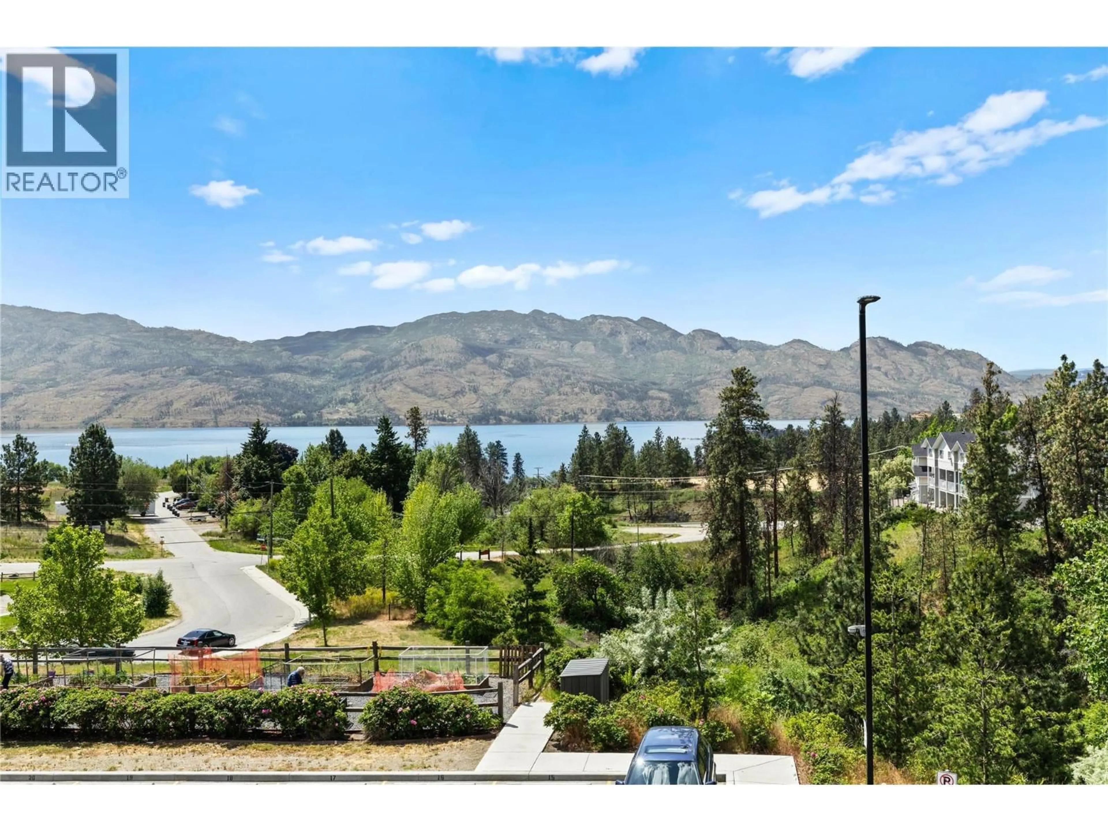 A pic from outside/outdoor area/front of a property/back of a property/a pic from drone, water/lake/river/ocean view for 303 - 2250 MAJOROS ROAD, West Kelowna British Columbia V4T0A6