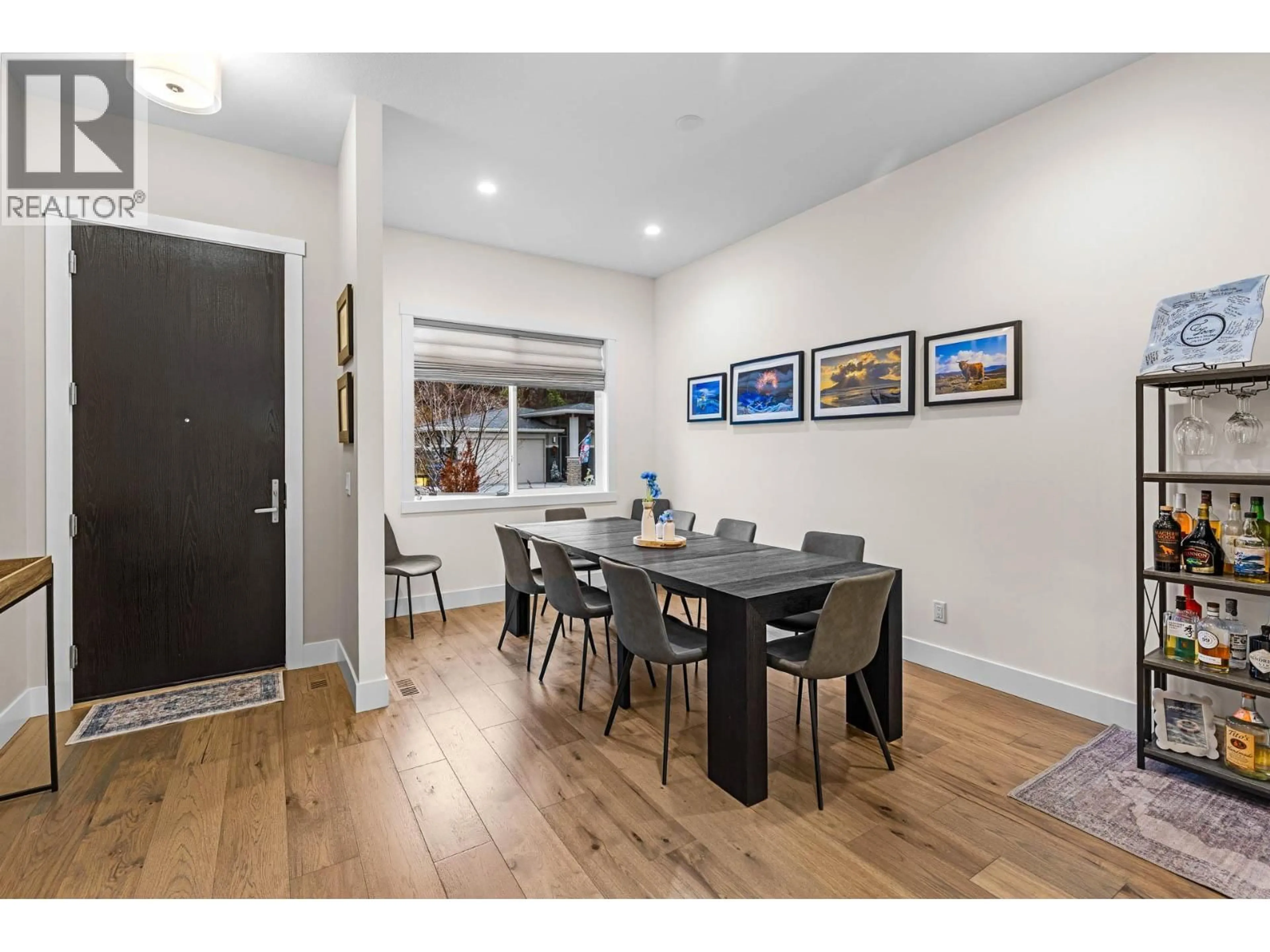 Dining room, wood/laminate floor for 1552 SUMMER CRESCENT, Kelowna British Columbia V1P1T8