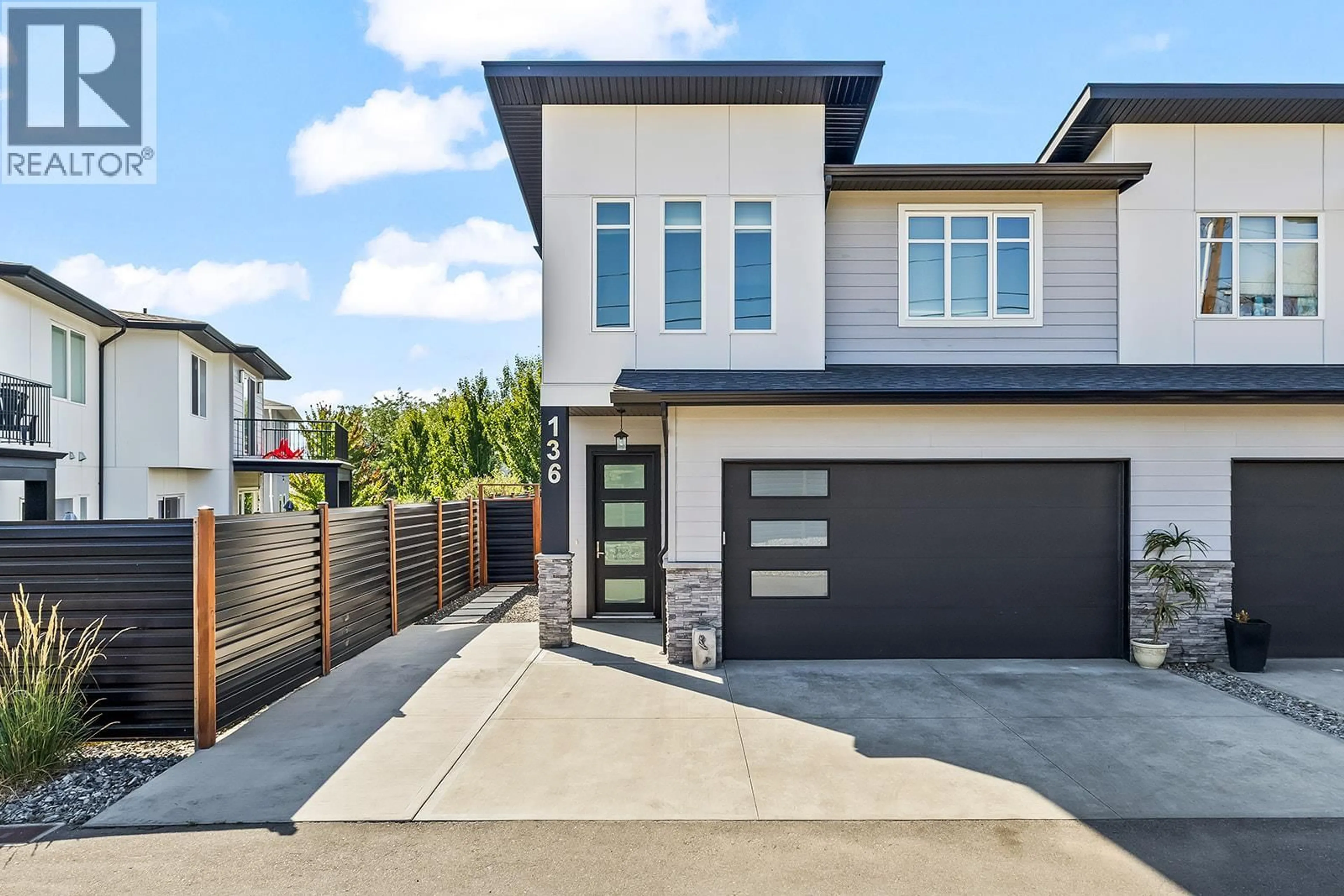 Home with brick exterior material, street for 136 SUMMERHILL PLACE, Kelowna British Columbia V1V1T6