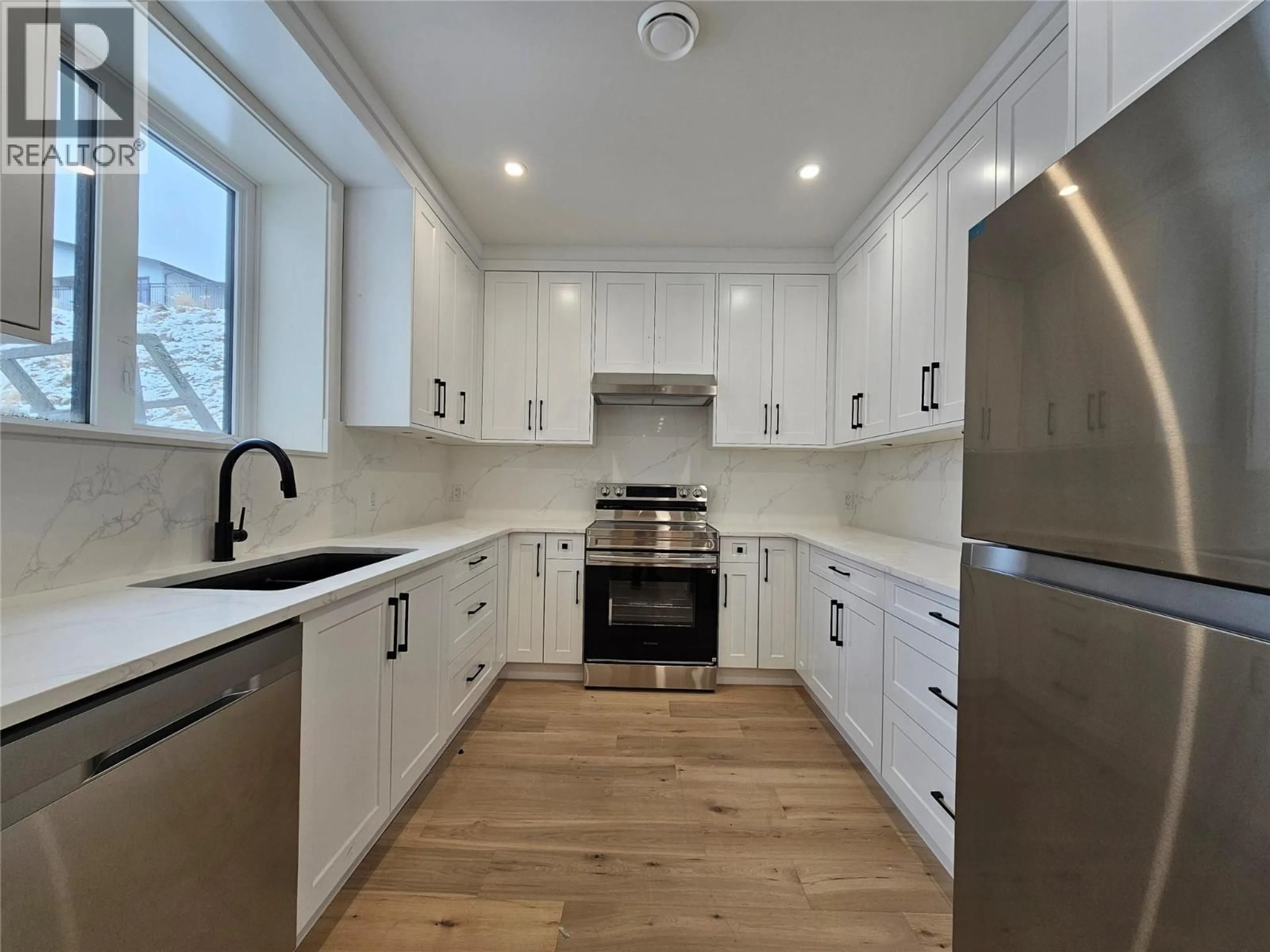 Open concept kitchen, unknown for 1122 CARNOUSTIE DRIVE, Kelowna British Columbia V1P0A3