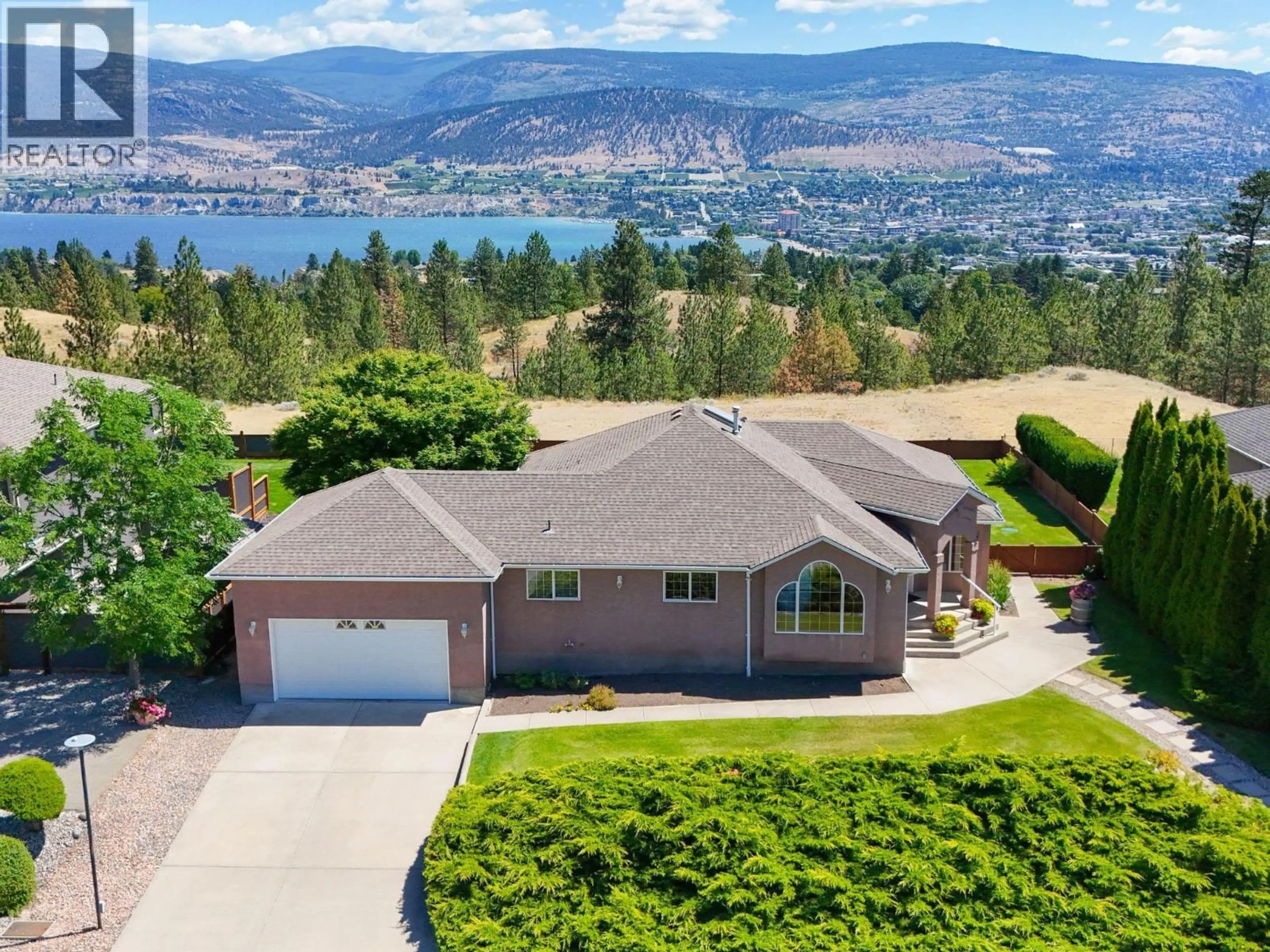 A pic from outside/outdoor area/front of a property/back of a property/a pic from drone, water/lake/river/ocean view for 1893 SANDSTONE DRIVE, Penticton British Columbia V2A8Y6