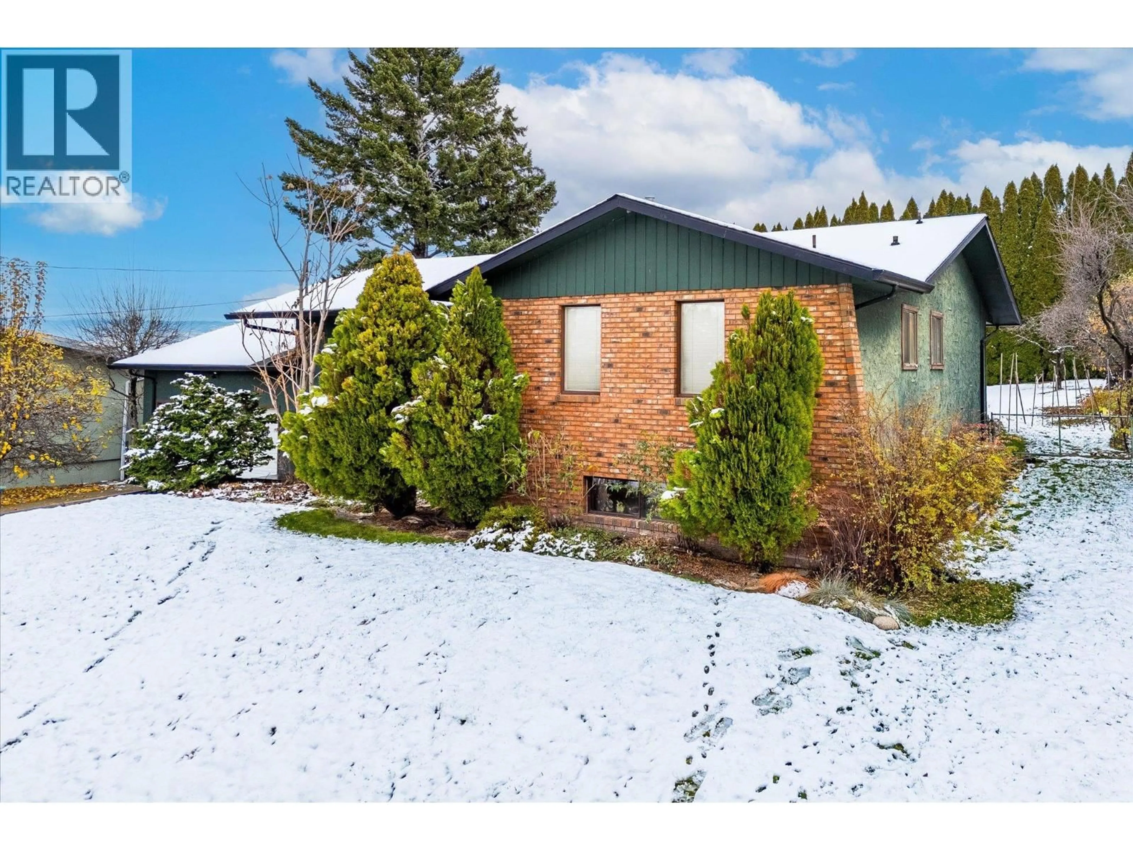 A pic from outside/outdoor area/front of a property/back of a property/a pic from drone, street for 2425 COLLINGWOOD ROAD, West Kelowna British Columbia V1Z3C3