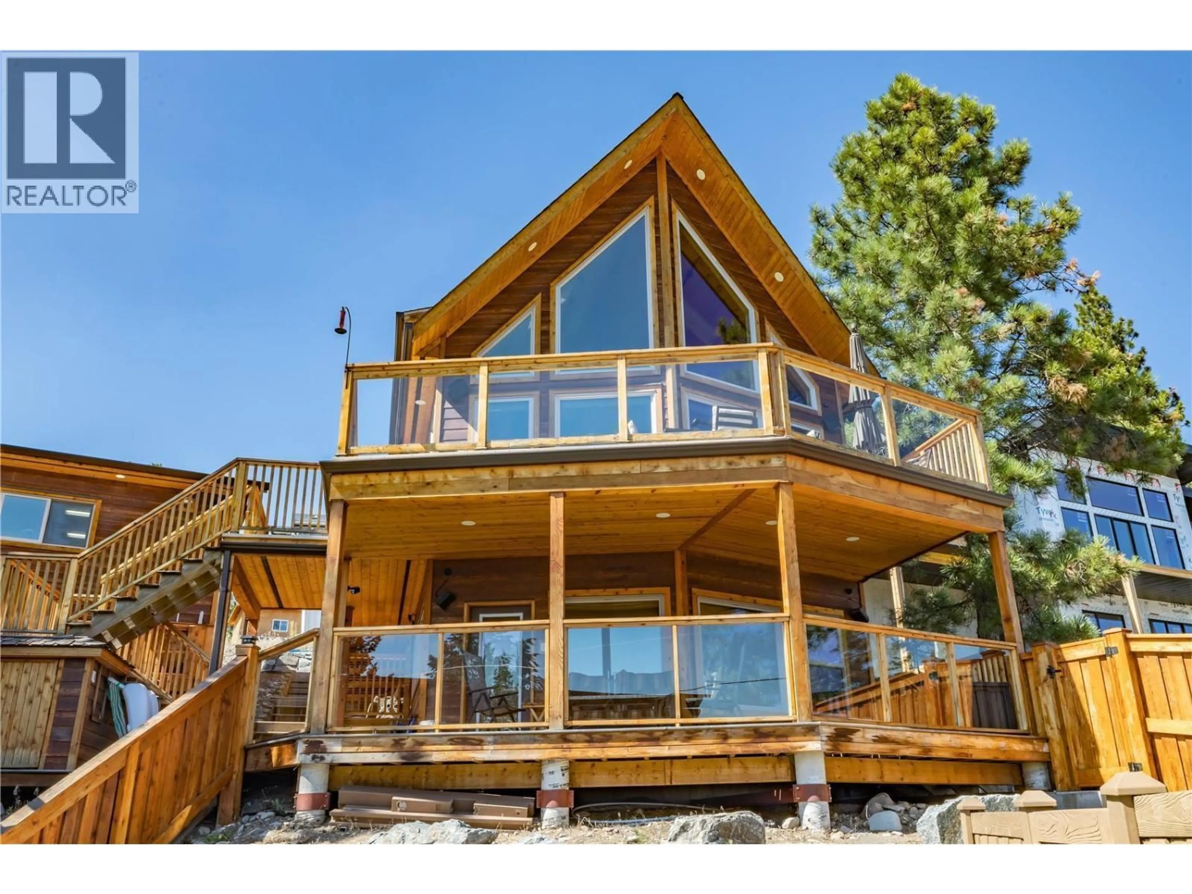 Home with vinyl exterior material, water/lake/river/ocean view for 563 MOUNTAIN DRIVE, Vernon British Columbia V1H2B7