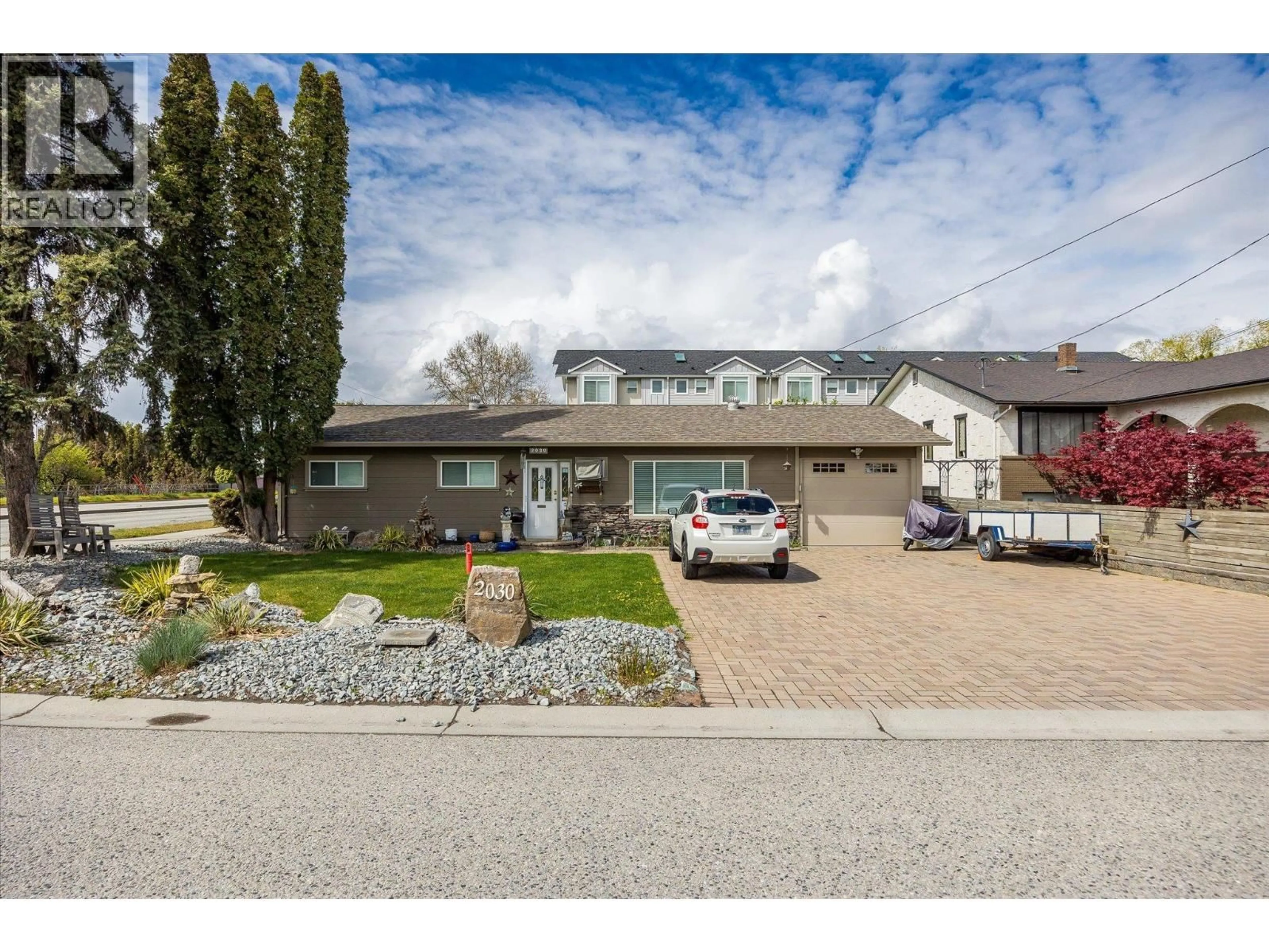 A pic from outside/outdoor area/front of a property/back of a property/a pic from drone, street for 2030 WILKINSON STREET, Kelowna British Columbia V1Y3Z8