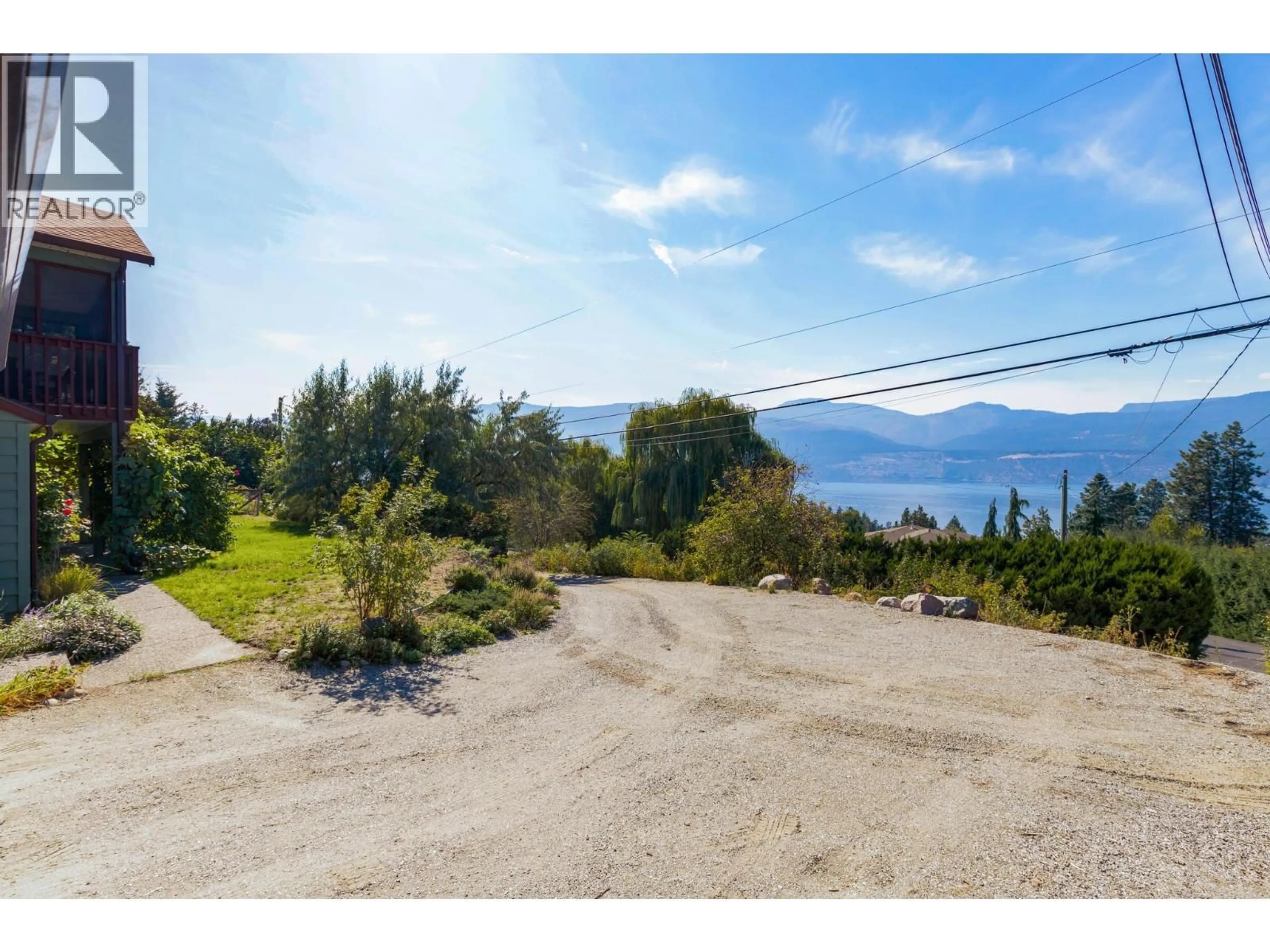 A pic from outside/outdoor area/front of a property/back of a property/a pic from drone, water/lake/river/ocean view for 16455 COMMONAGE ROAD, Lake Country British Columbia V4V1B3