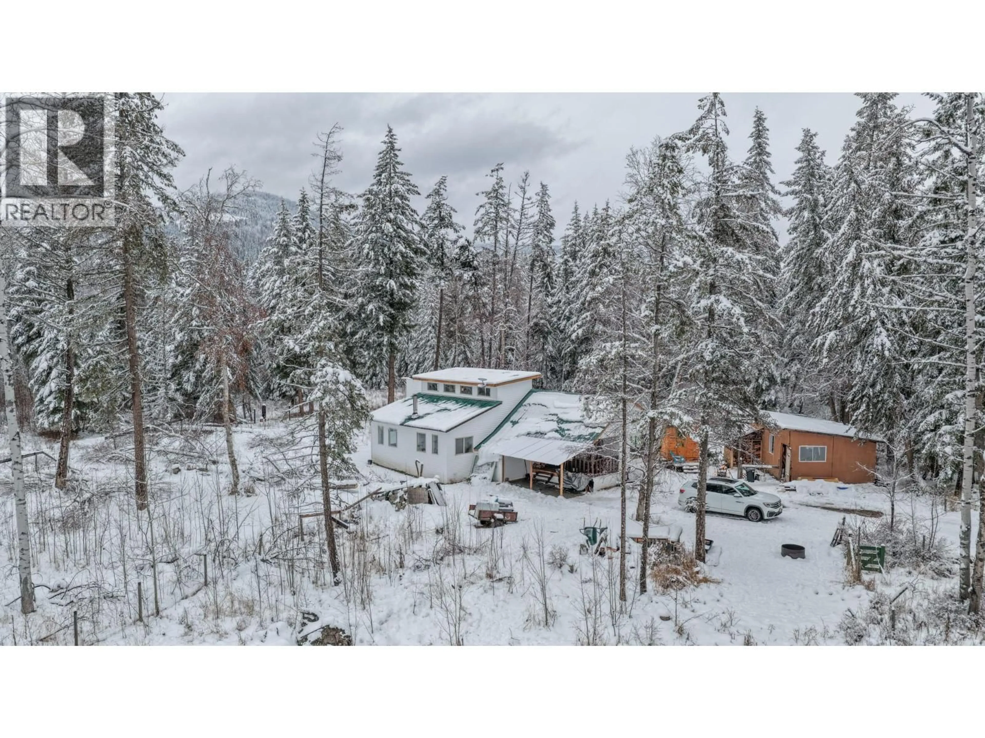 A pic from outside/outdoor area/front of a property/back of a property/a pic from drone, forest/trees view for 6739 KARJULA ROAD, Falkland British Columbia V0E1W1