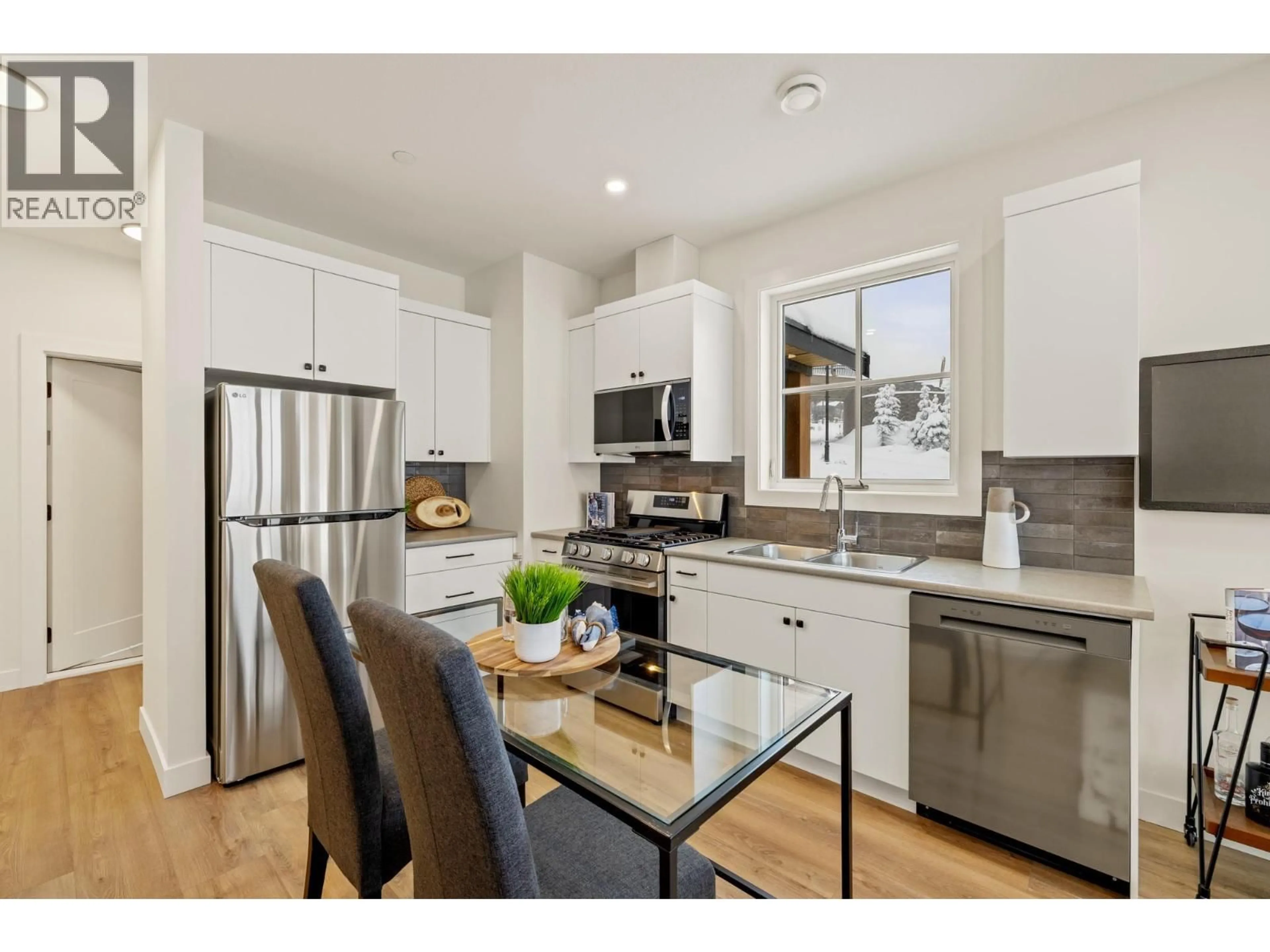 Open concept kitchen, wood/laminate floor for 89 - 255 FEATHERTOP WAY, Big White British Columbia V1P1T4