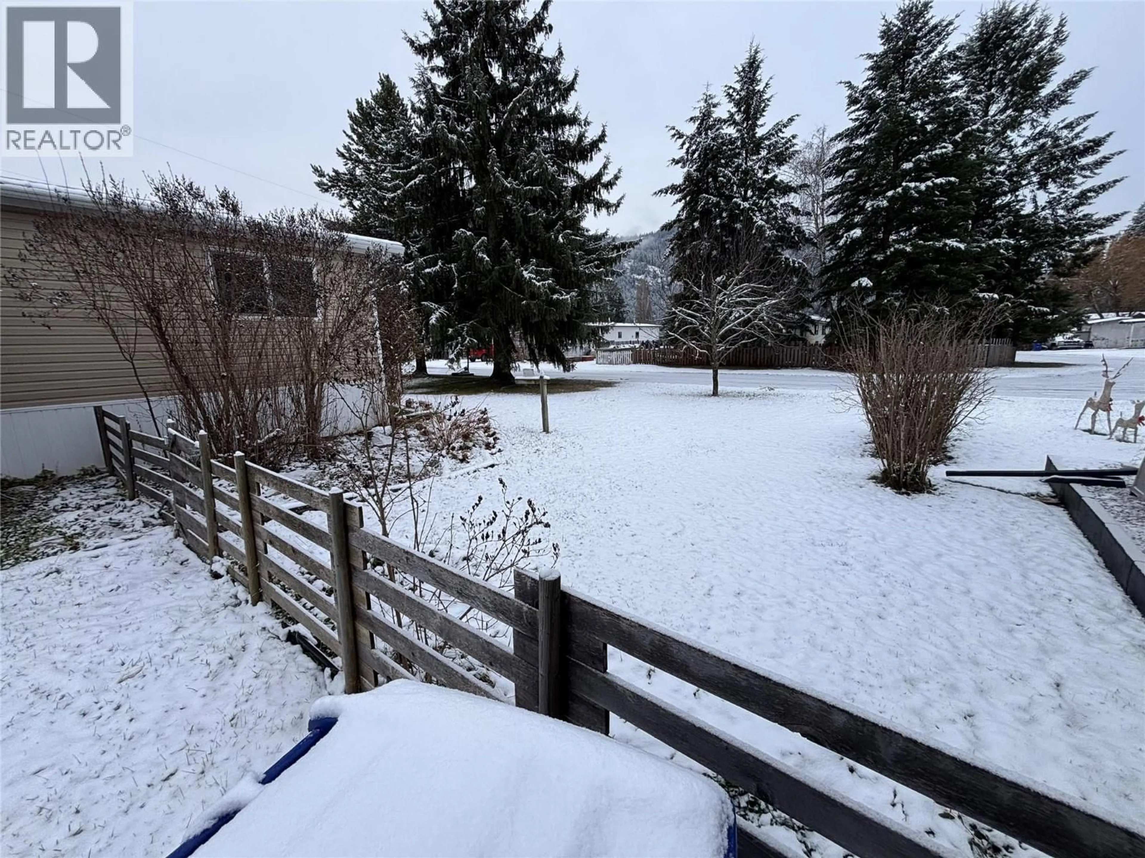 A pic from outside/outdoor area/front of a property/back of a property/a pic from drone, forest/trees view for B6 - 446 LUMBY MABEL LAKE ROAD, Lumby British Columbia V0E2G5