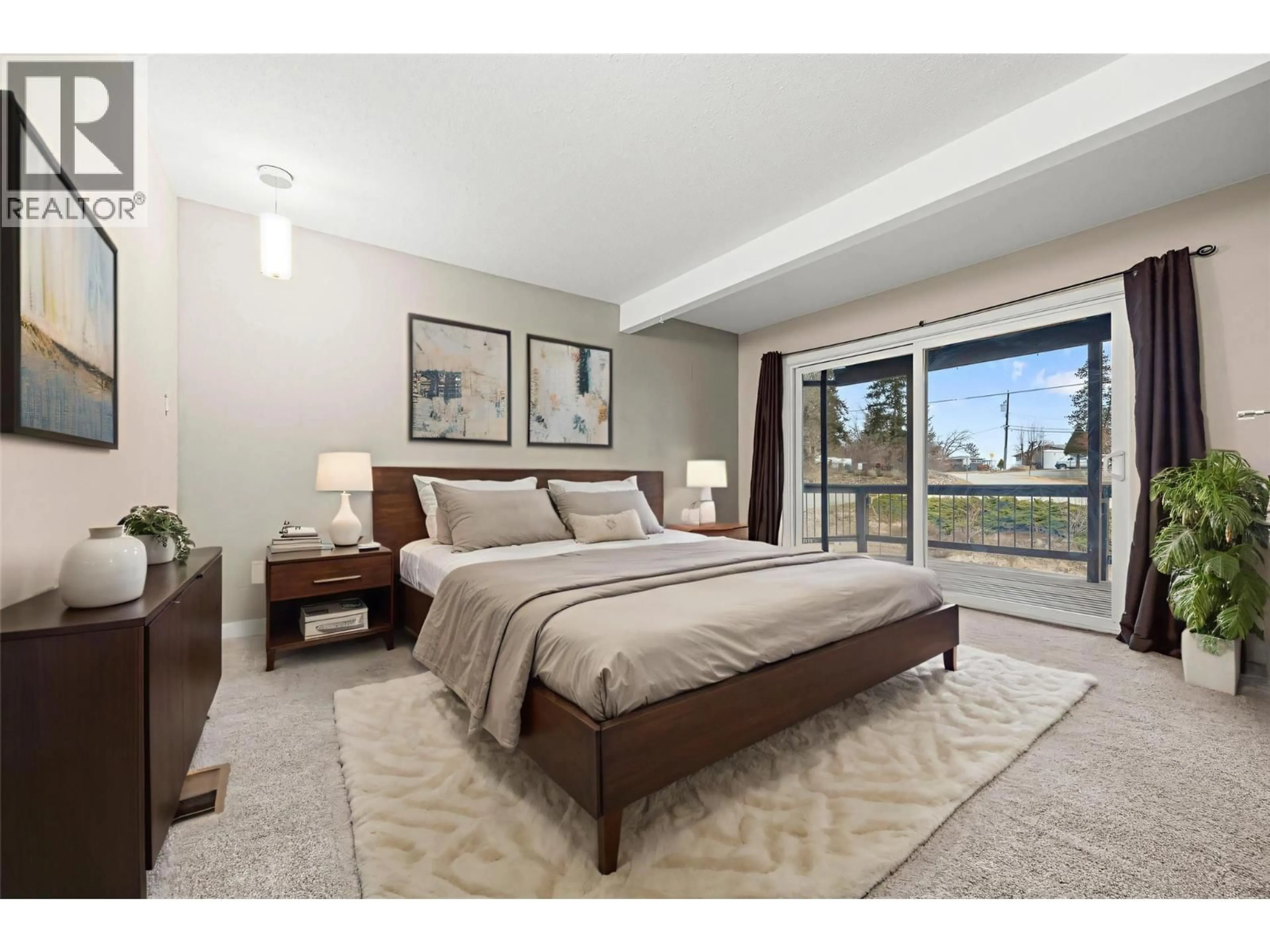 Bedroom with bed, carpet floor for 6348 FOREST HILL DRIVE, Peachland British Columbia V0H1X8