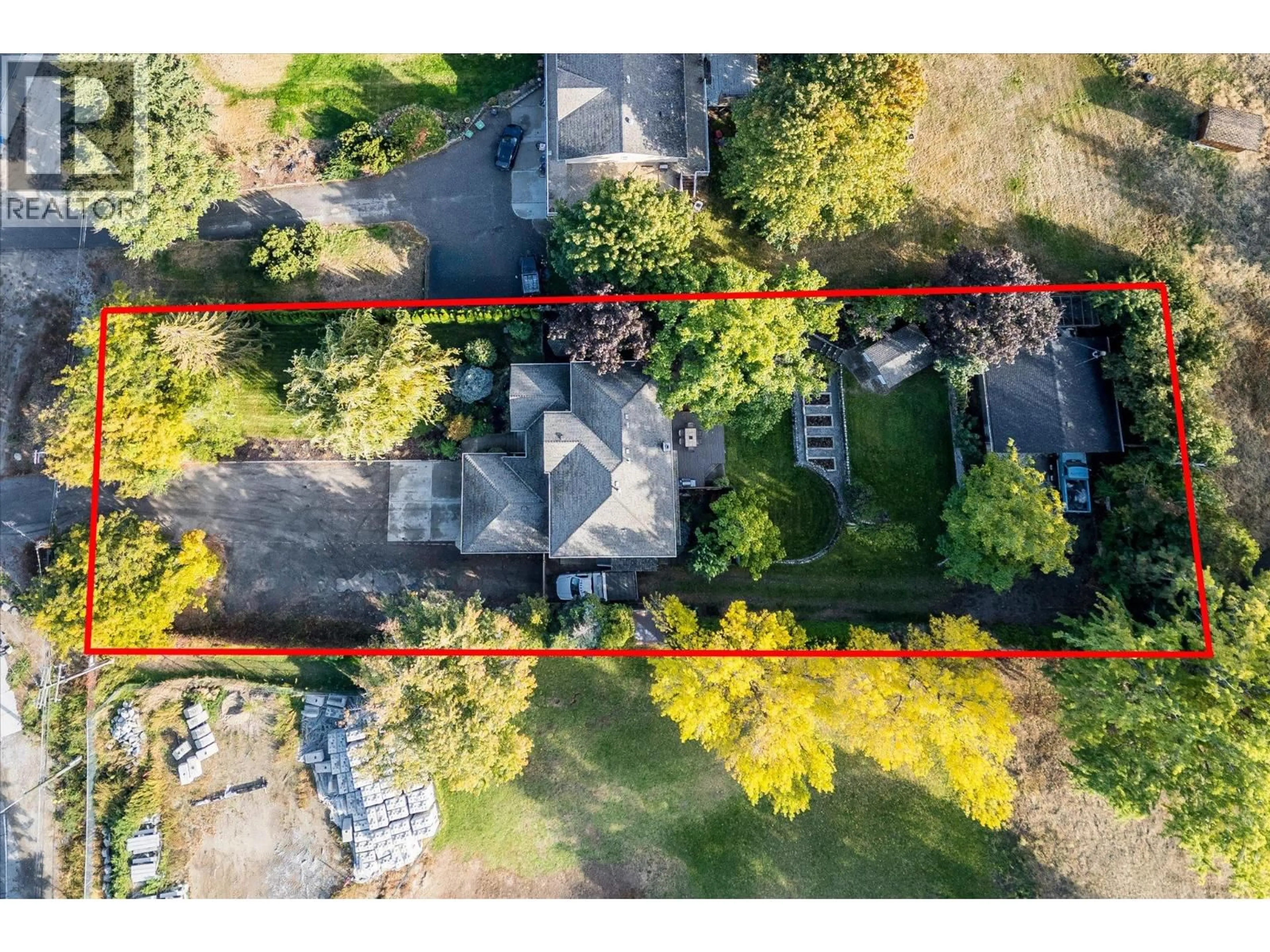 A pic from outside/outdoor area/front of a property/back of a property/a pic from drone, street for 1189 HUDSON ROAD, West Kelowna British Columbia V1Z1J2