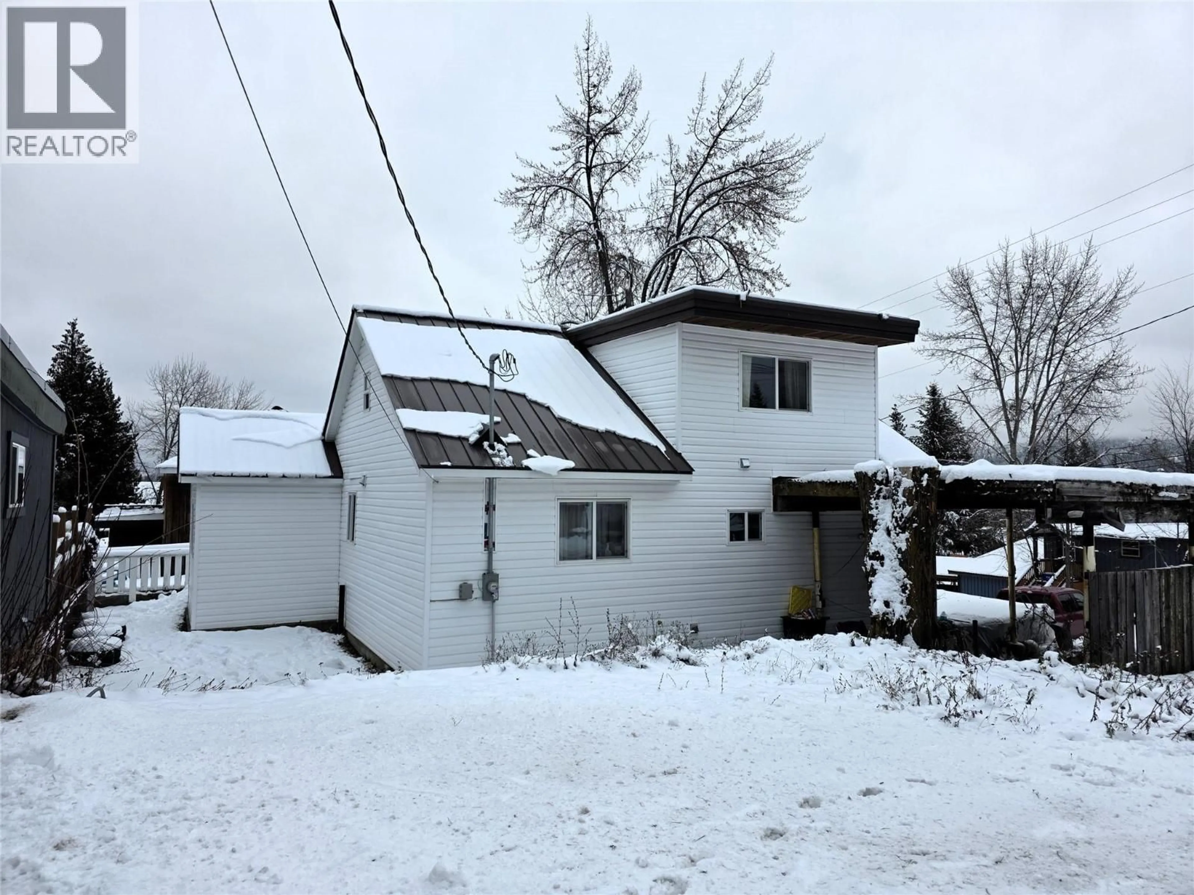 A pic from outside/outdoor area/front of a property/back of a property/a pic from drone, street for 1704 SECOND AVENUE, Rossland British Columbia V0G1Y0