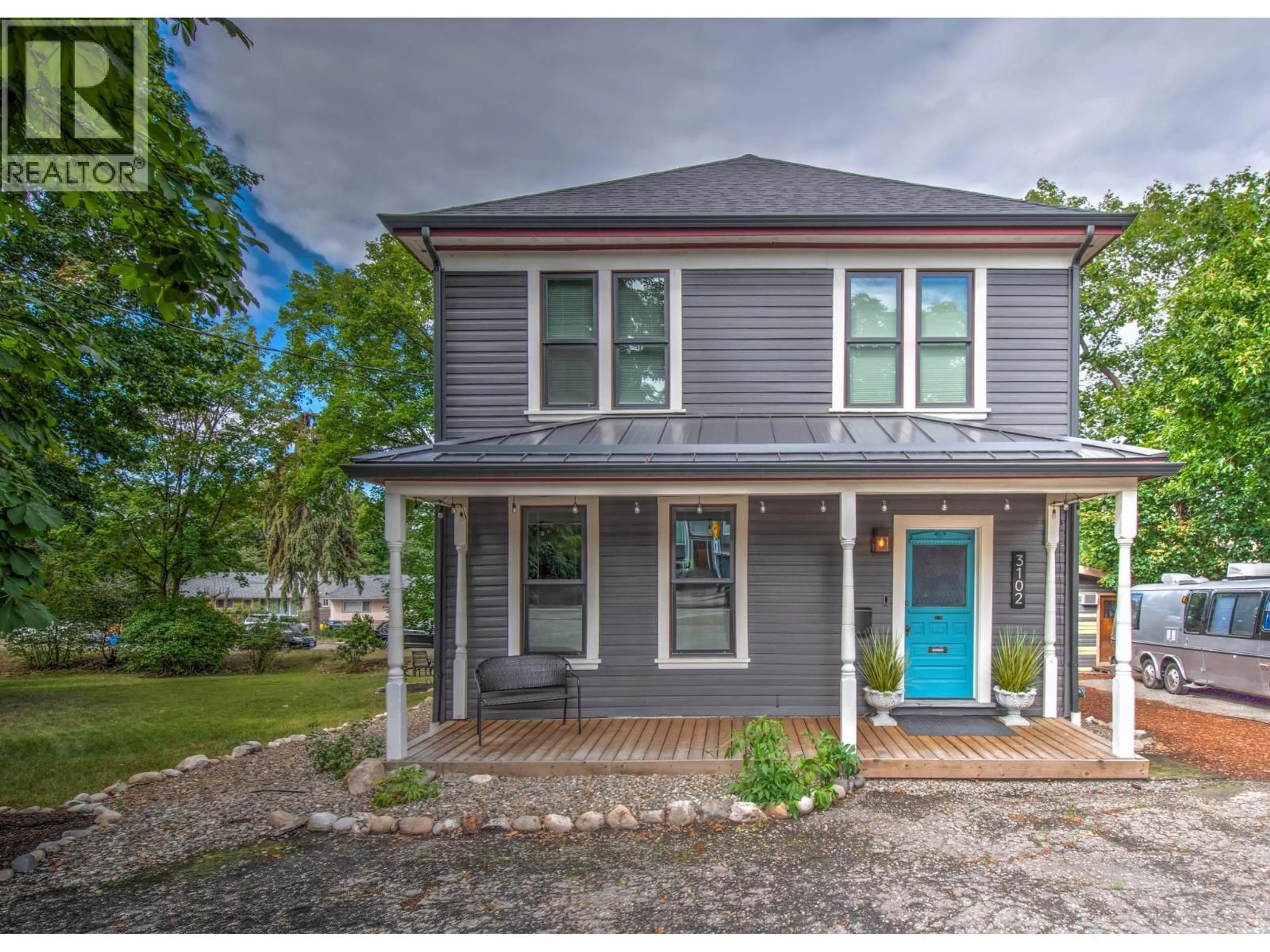 Home with vinyl exterior material, street for 3102 PLEASANT VALLEY ROAD, Vernon British Columbia V1T4L3