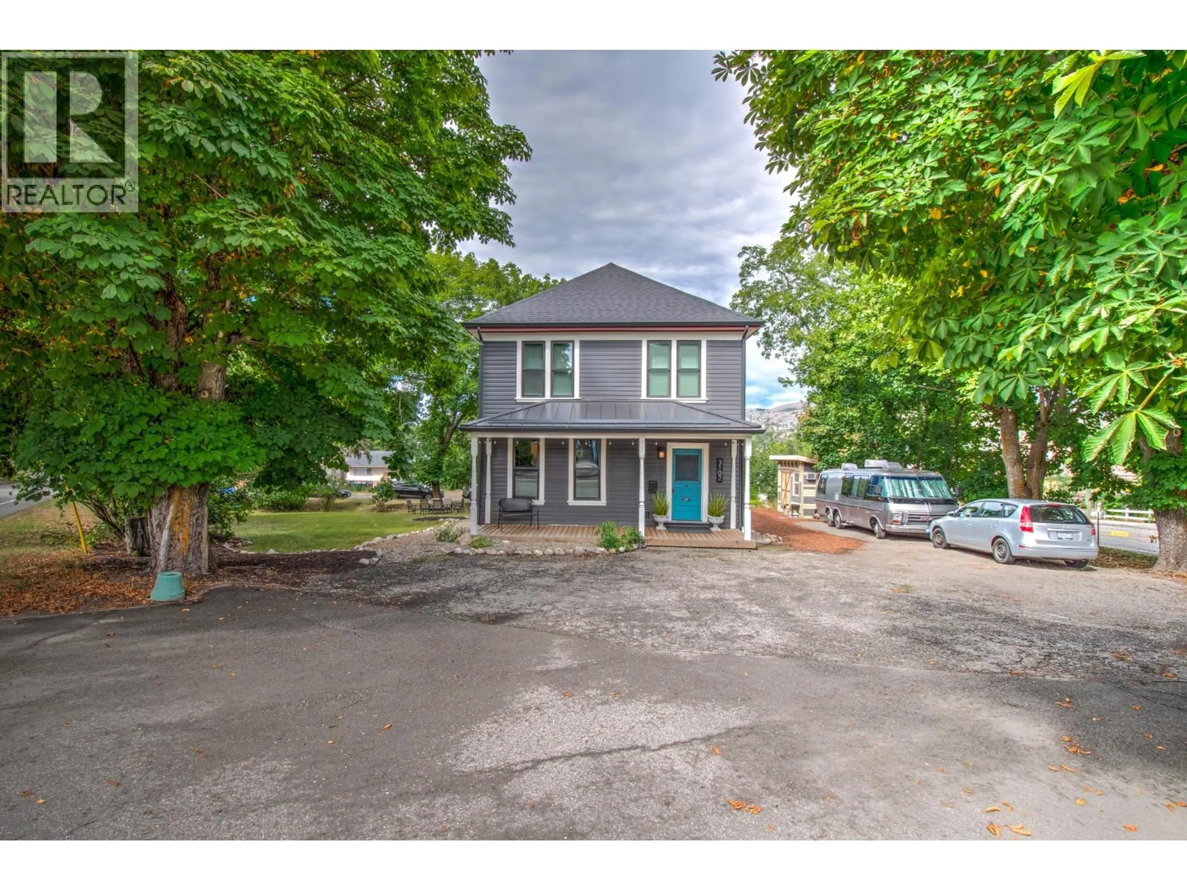 A pic from outside/outdoor area/front of a property/back of a property/a pic from drone, street for 3102 PLEASANT VALLEY ROAD, Vernon British Columbia V1T4L3