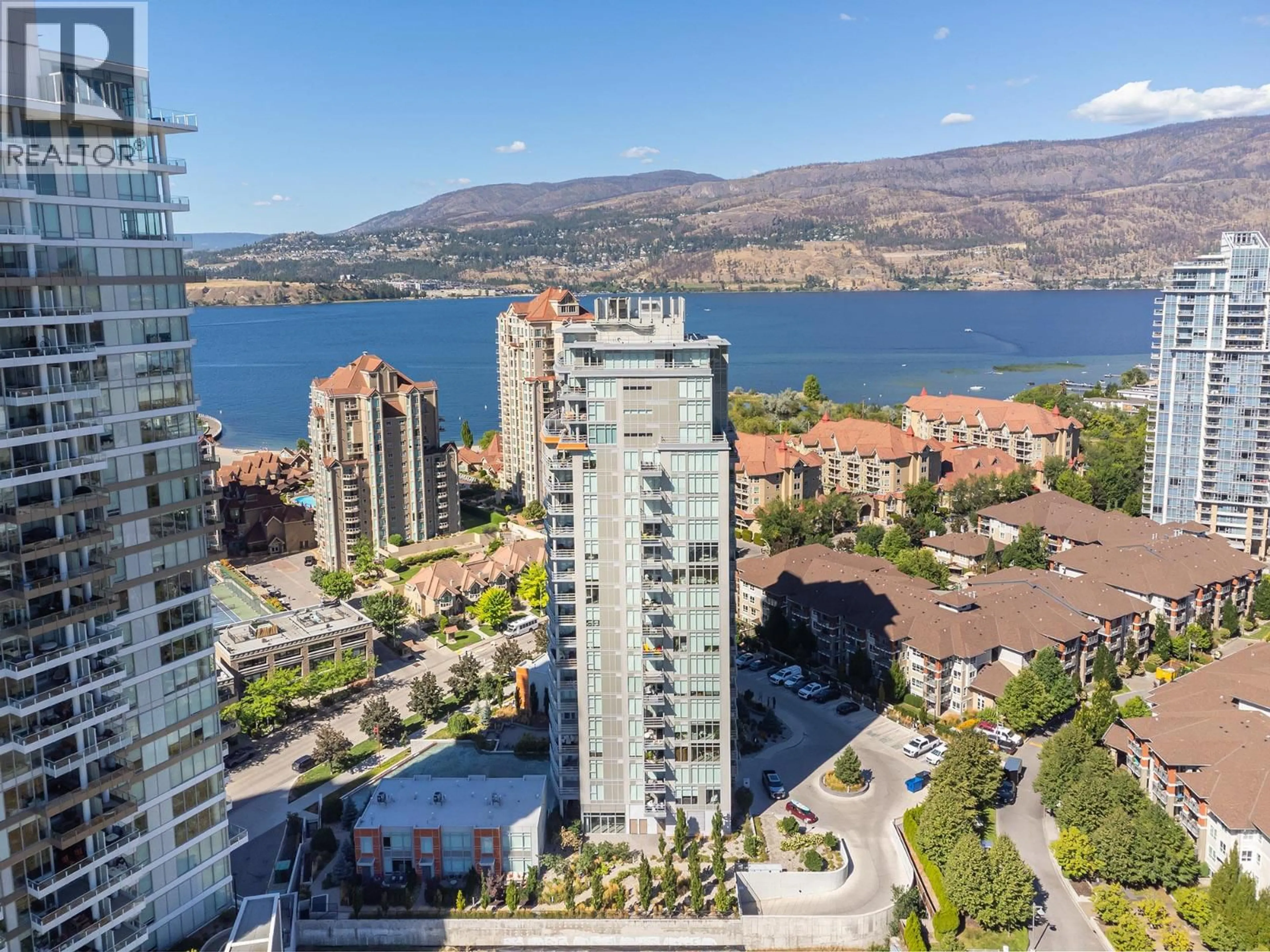 A pic from outside/outdoor area/front of a property/back of a property/a pic from drone, water/lake/river/ocean view for 1001 - 1151 SUNSET DRIVE, Kelowna British Columbia V1Y0G2
