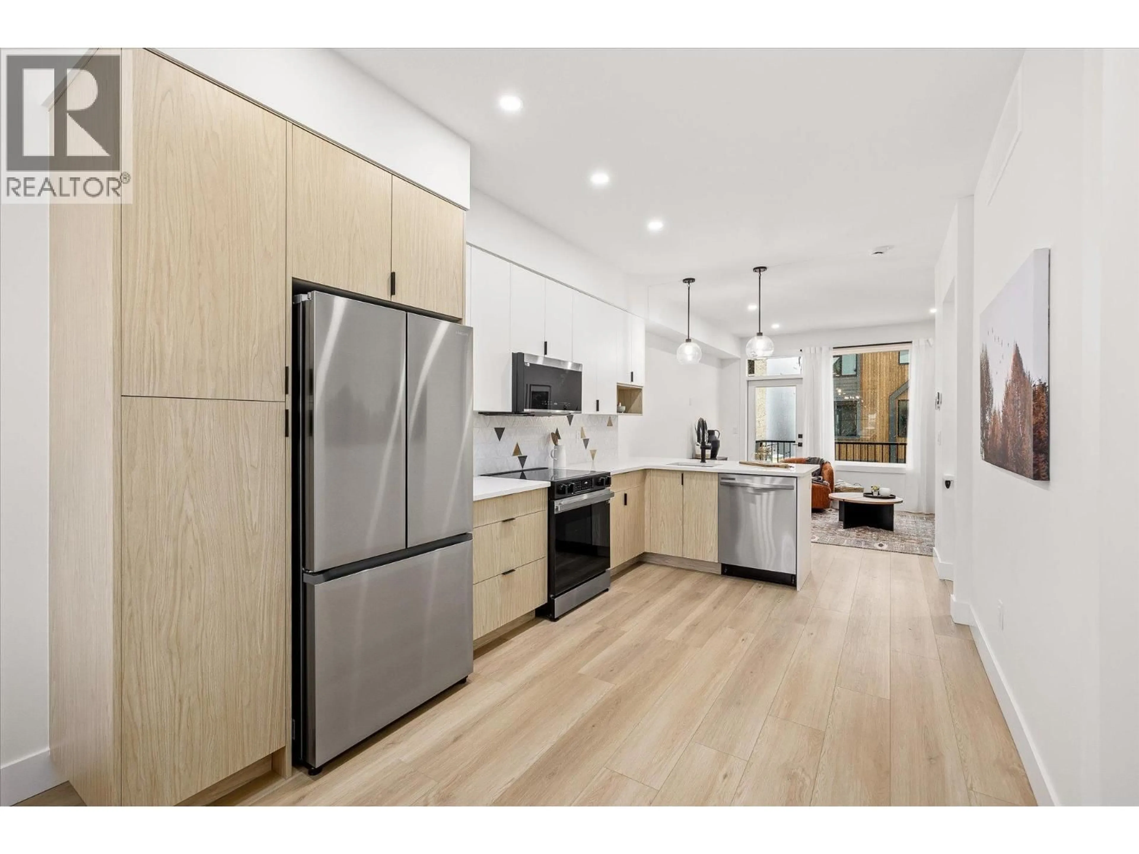 Open concept kitchen, wood/laminate floor for 23 - 416 HUMBERT STREET, Revelstoke British Columbia V0E2S1