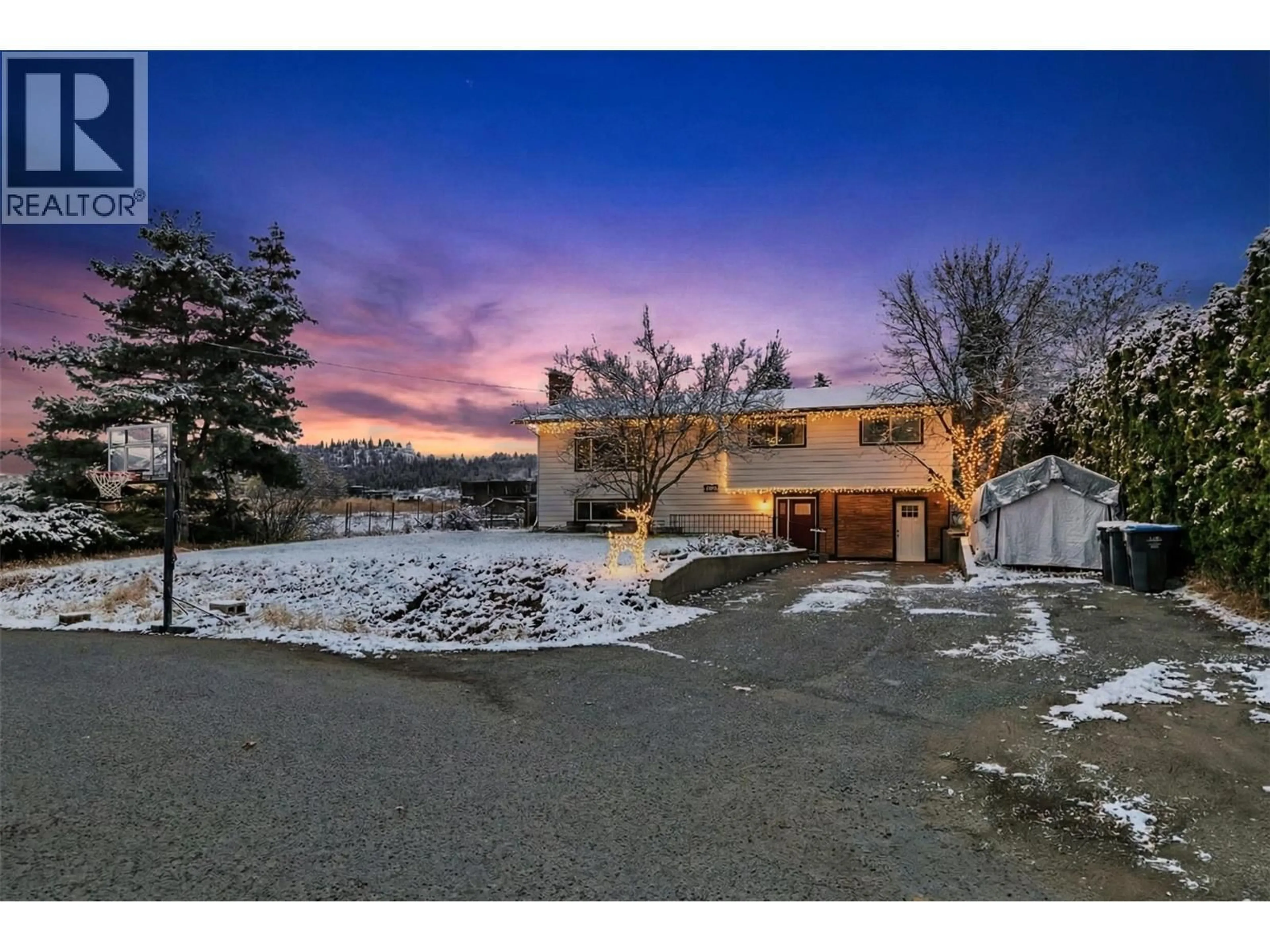 A pic from outside/outdoor area/front of a property/back of a property/a pic from drone, mountain view for 10010 KEL WIN ROAD, Lake Country British Columbia V4V1L4