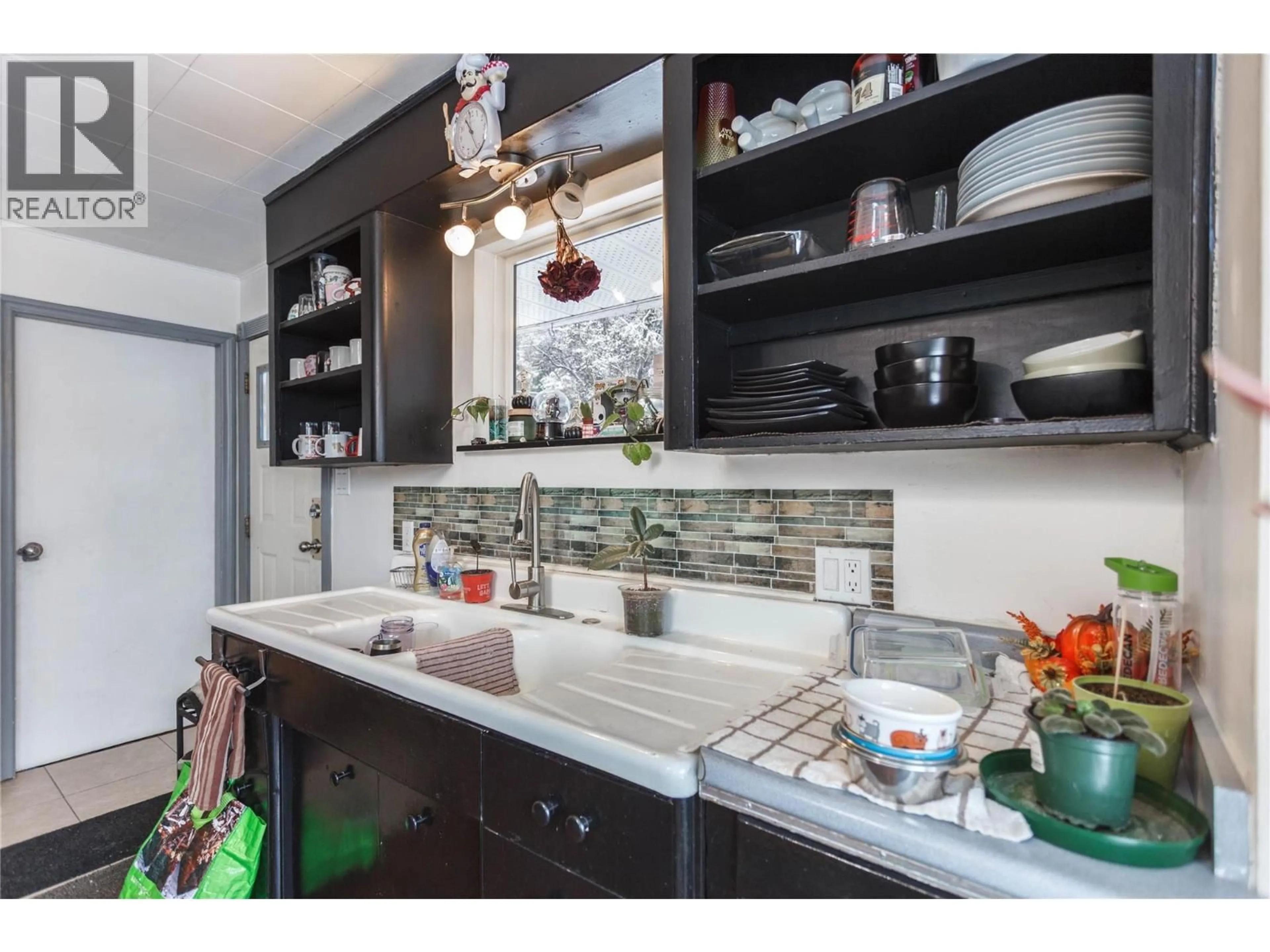 Contemporary kitchen, ceramic/tile floor for 2017 CATT AVENUE, Lumby British Columbia V0E2G0