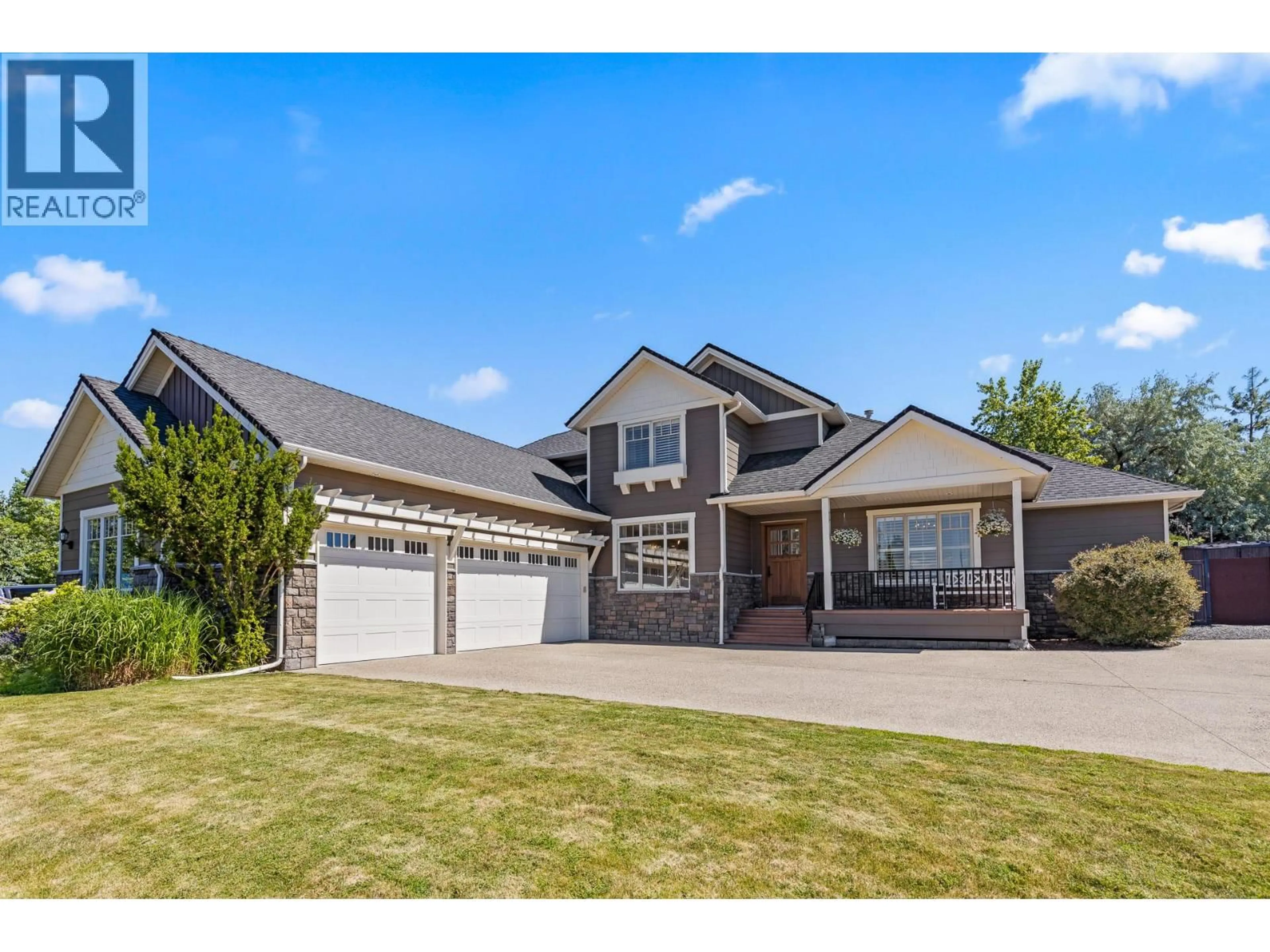 Home with vinyl exterior material, street for 1511 WOODRIDGE ROAD, Kelowna British Columbia V1W3B4