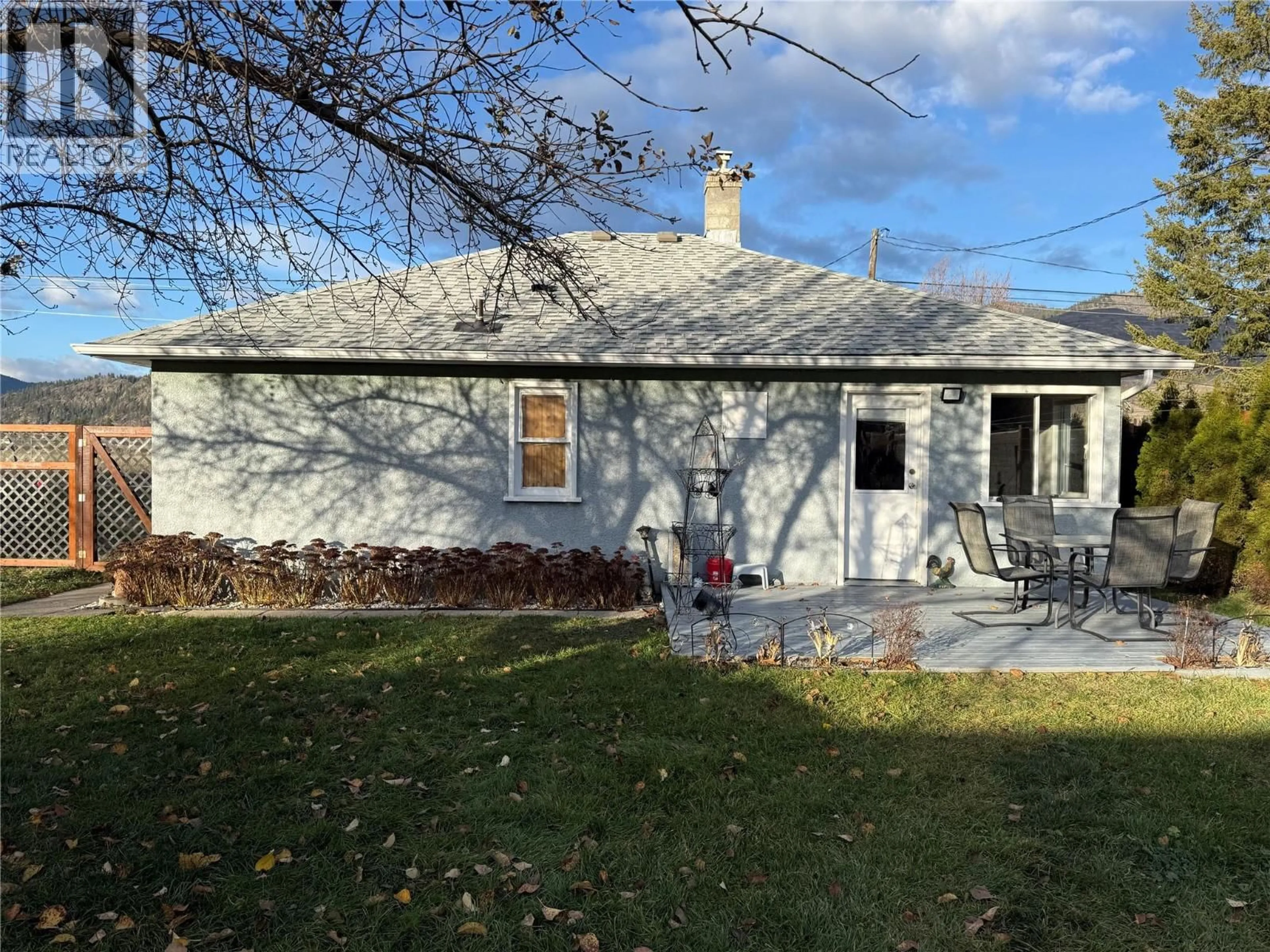 A pic from outside/outdoor area/front of a property/back of a property/a pic from drone, street for 580 CAMERON AVENUE, Grand Forks British Columbia V0H1H4