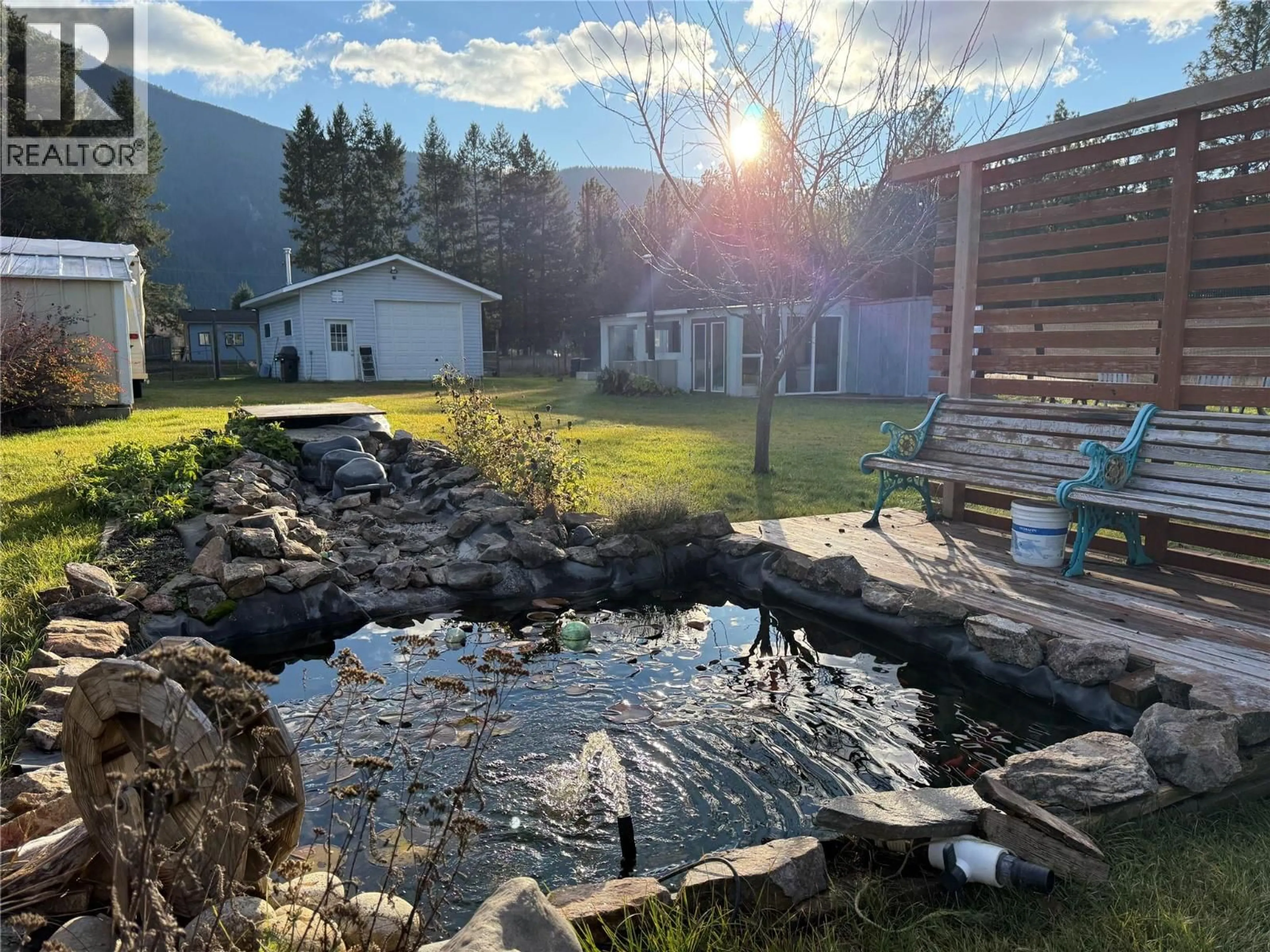 A pic from outside/outdoor area/front of a property/back of a property/a pic from drone, water/lake/river/ocean view for 580 CAMERON AVENUE, Grand Forks British Columbia V0H1H4