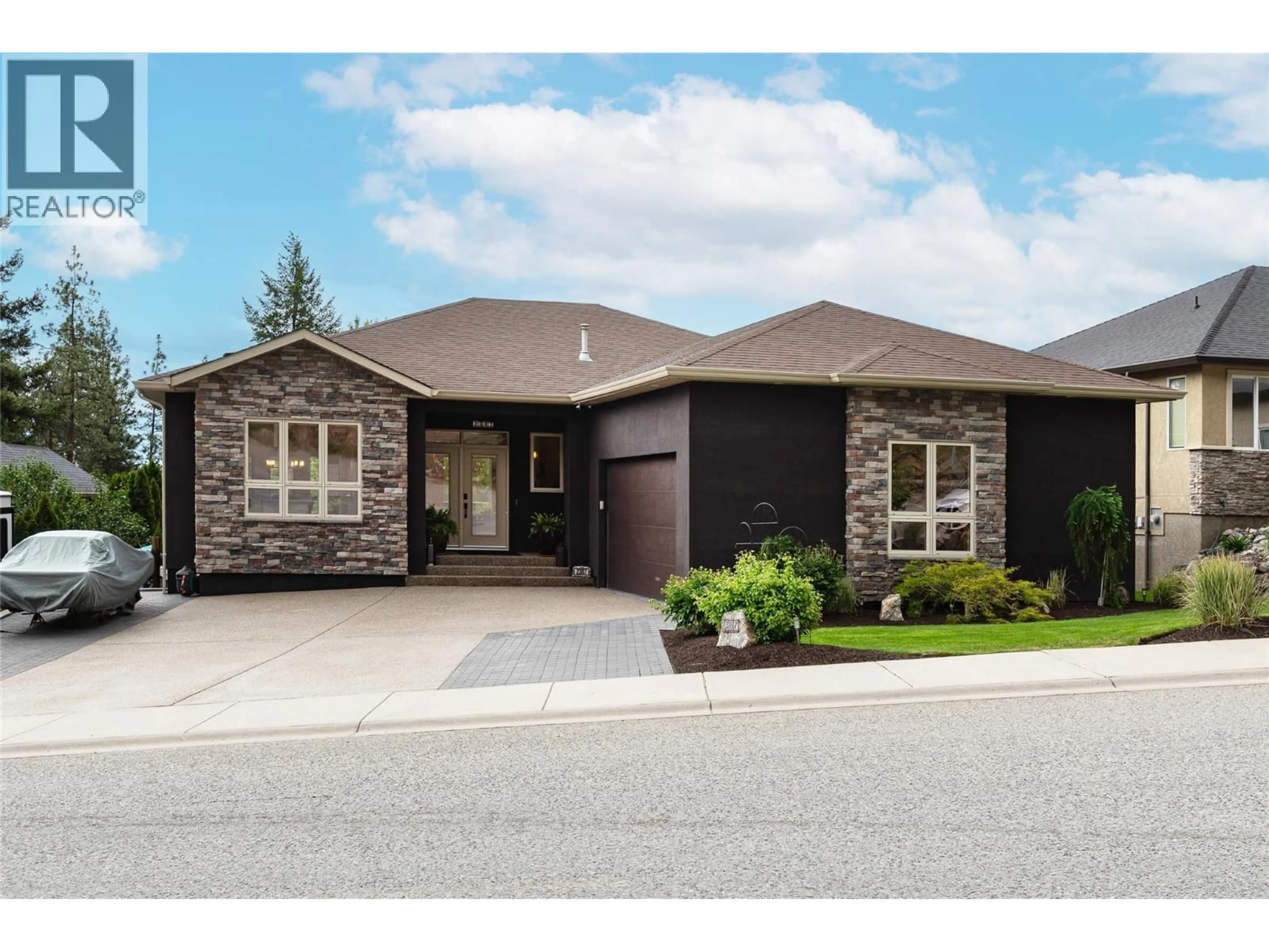 Home with brick exterior material, street for 2387 TALLUS RIDGE DRIVE, West Kelowna British Columbia V4T3A6