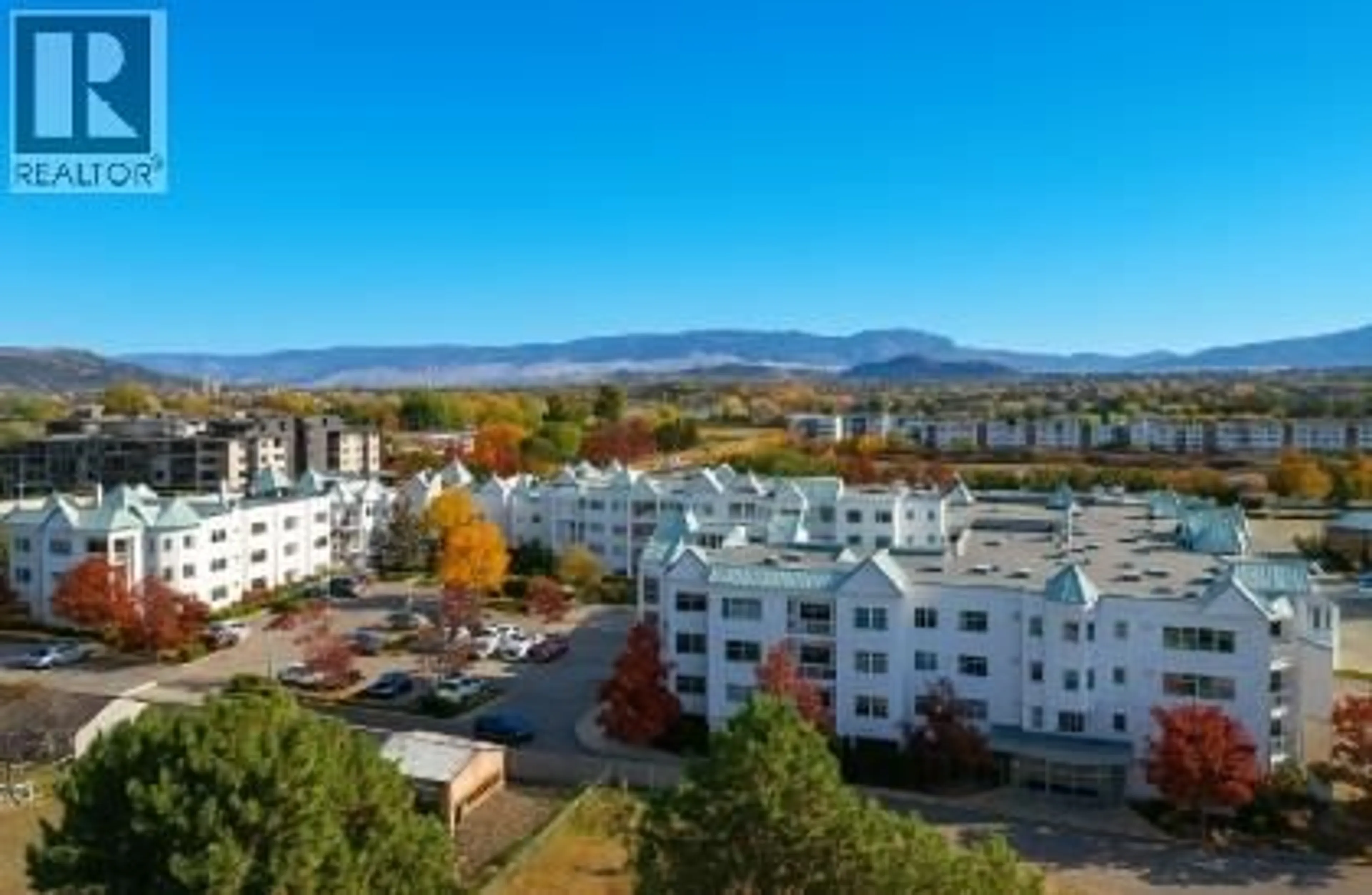 A pic from outside/outdoor area/front of a property/back of a property/a pic from drone, mountain view for 220 - 1329 KLO ROAD, Kelowna British Columbia V1W3N9