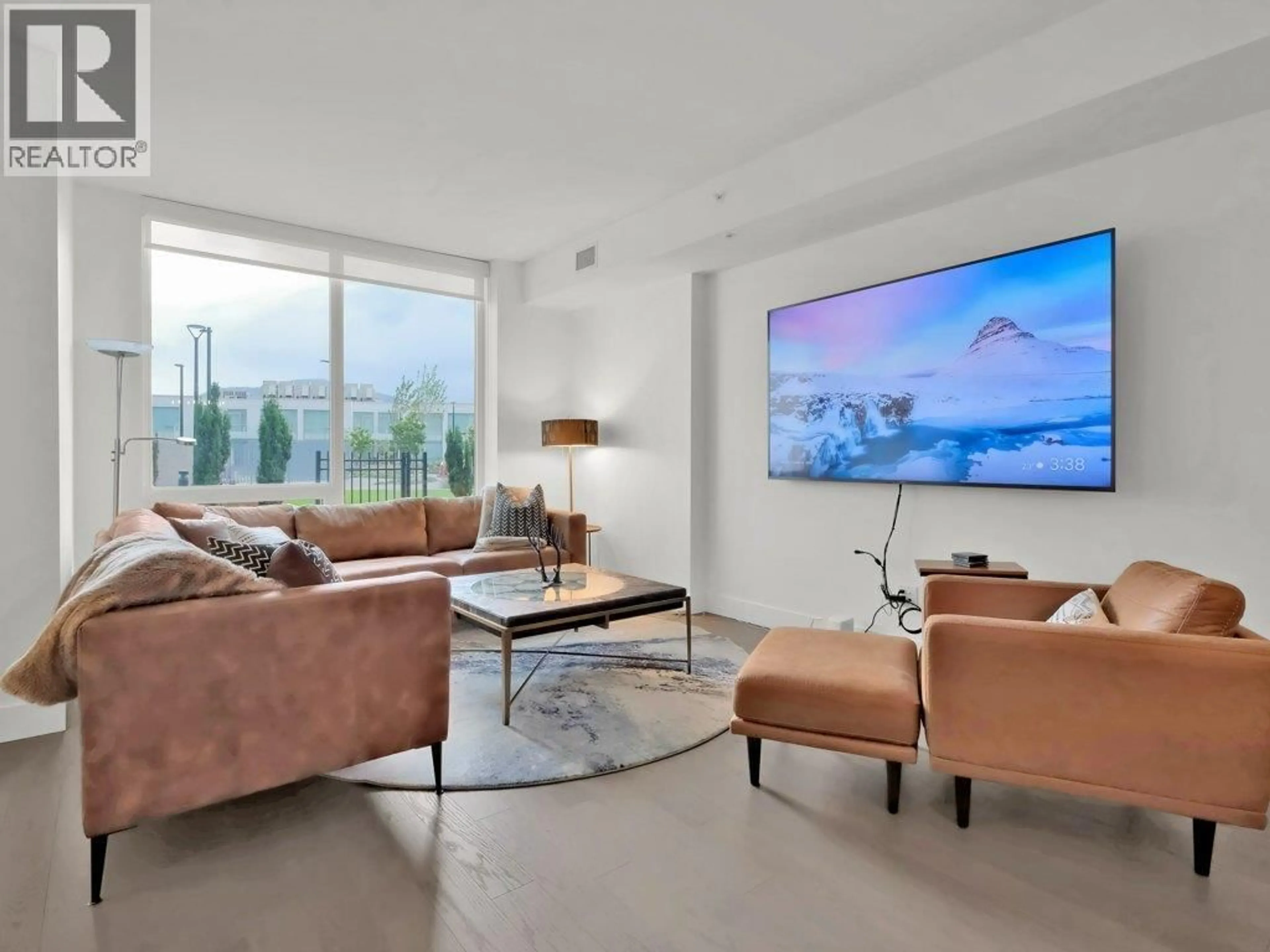 Living room with furniture, unknown for 401 - 1191 SUNSET DRIVE, Kelowna British Columbia V1Y9Z5