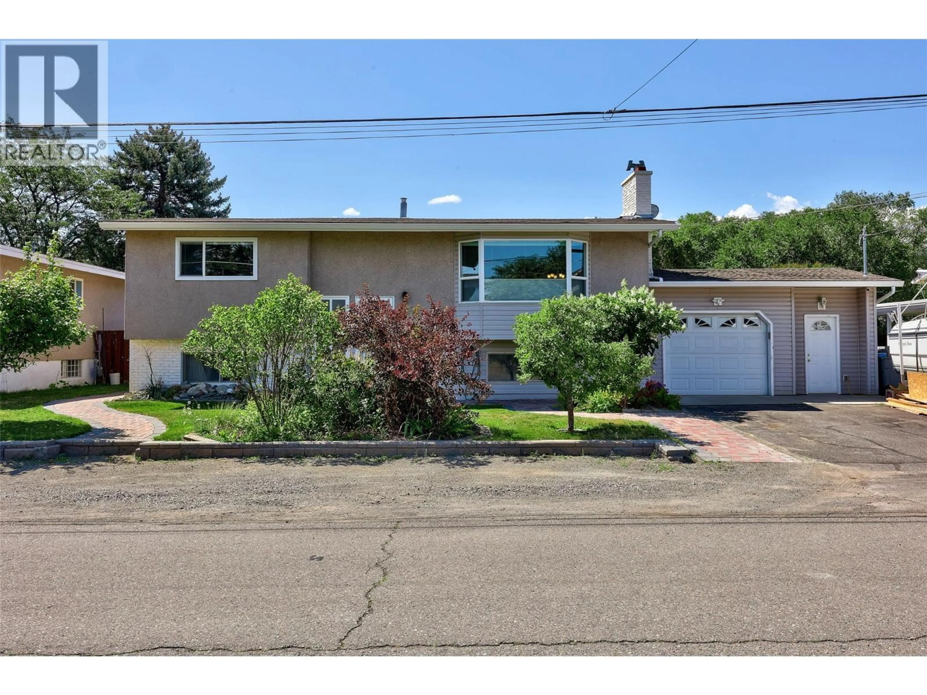 Home with vinyl exterior material, street for 1265 BARRIE DRIVE, Kamloops British Columbia V2B3Y3