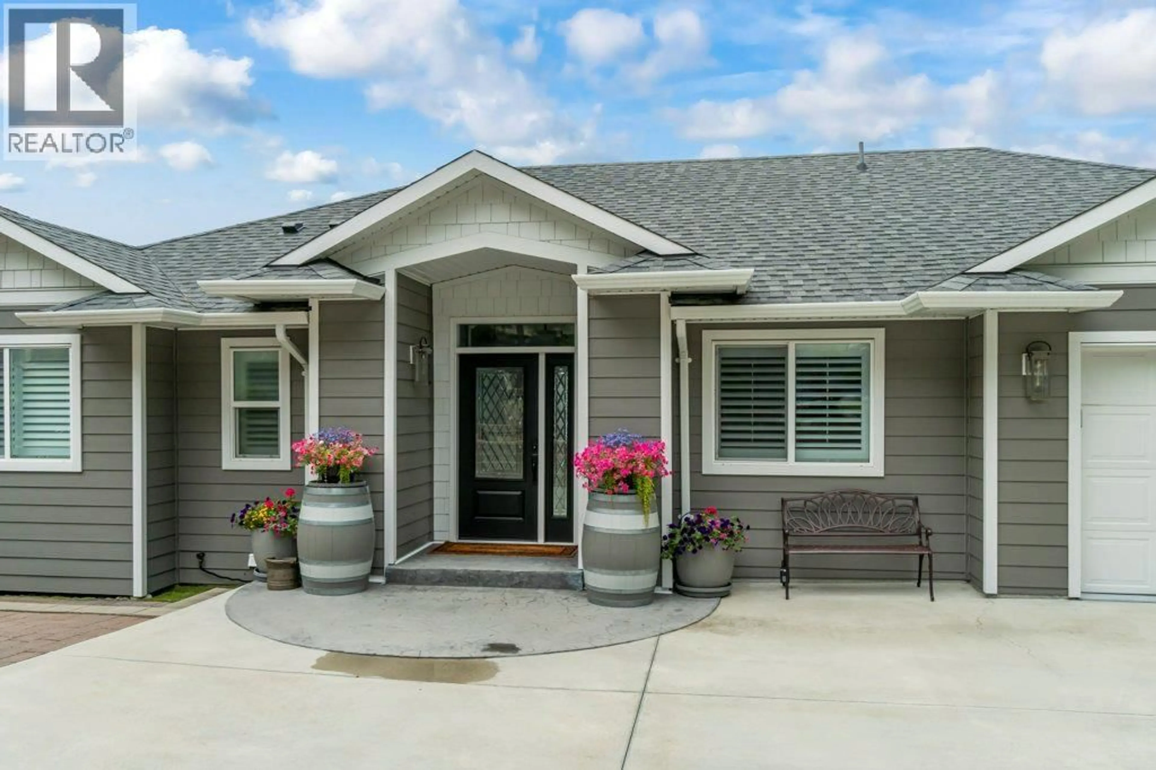 Home with vinyl exterior material, street for 3949 DESERT PINES AVENUE, Peachland British Columbia V0H1X2