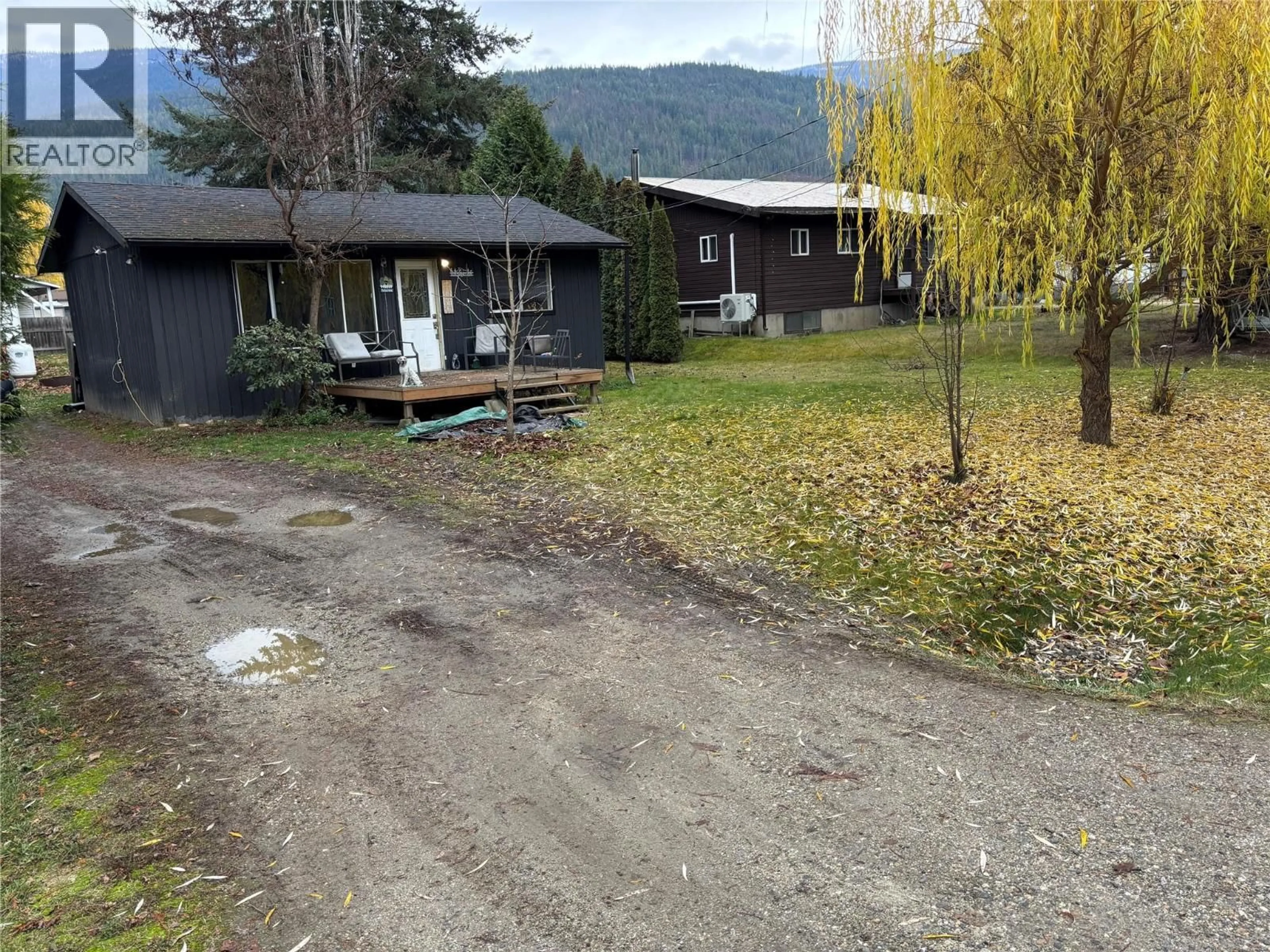 A pic from outside/outdoor area/front of a property/back of a property/a pic from drone, mountain view for 1233 TUNNEY AVENUE, Sicamous British Columbia V0E2V1