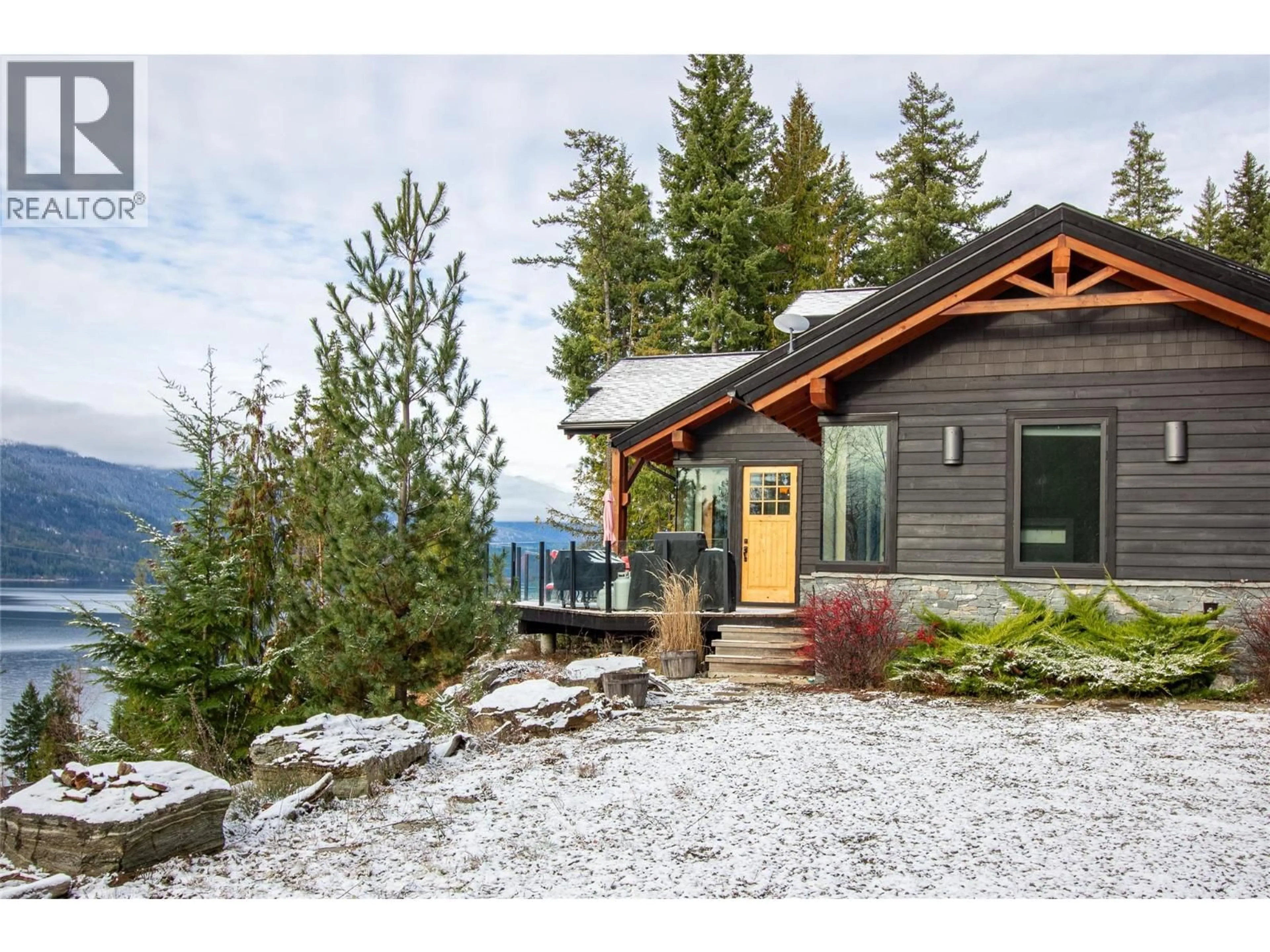 Home with vinyl exterior material, mountain view for 234 WALKERS LANE, Kootenay Bay British Columbia V0B1X0