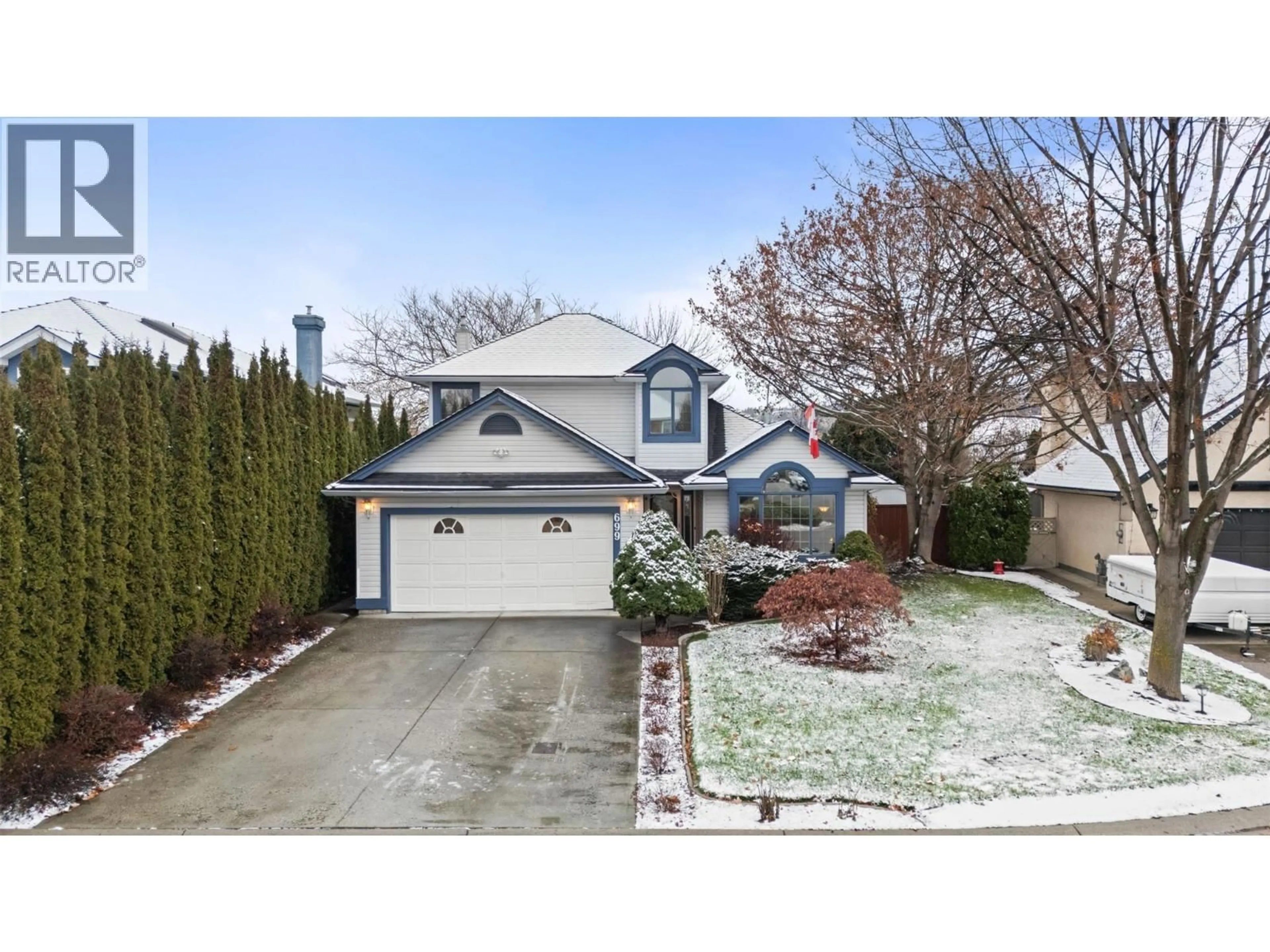 Home with vinyl exterior material, street for 699 SARATOGA PLACE, Kelowna British Columbia V1W2Z6