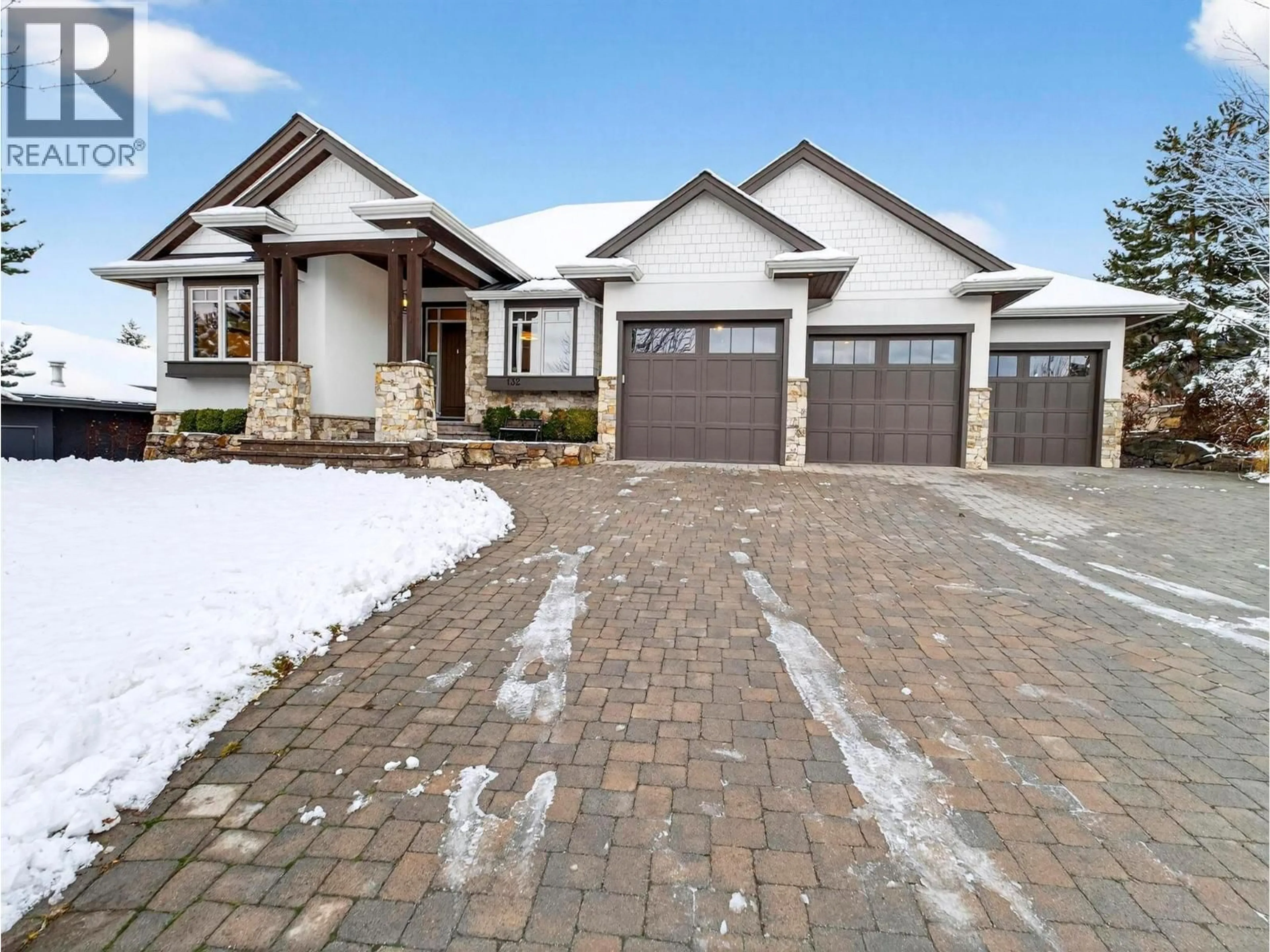 Home with brick exterior material, street for 132 SKY COURT, Kelowna British Columbia V1V3A2