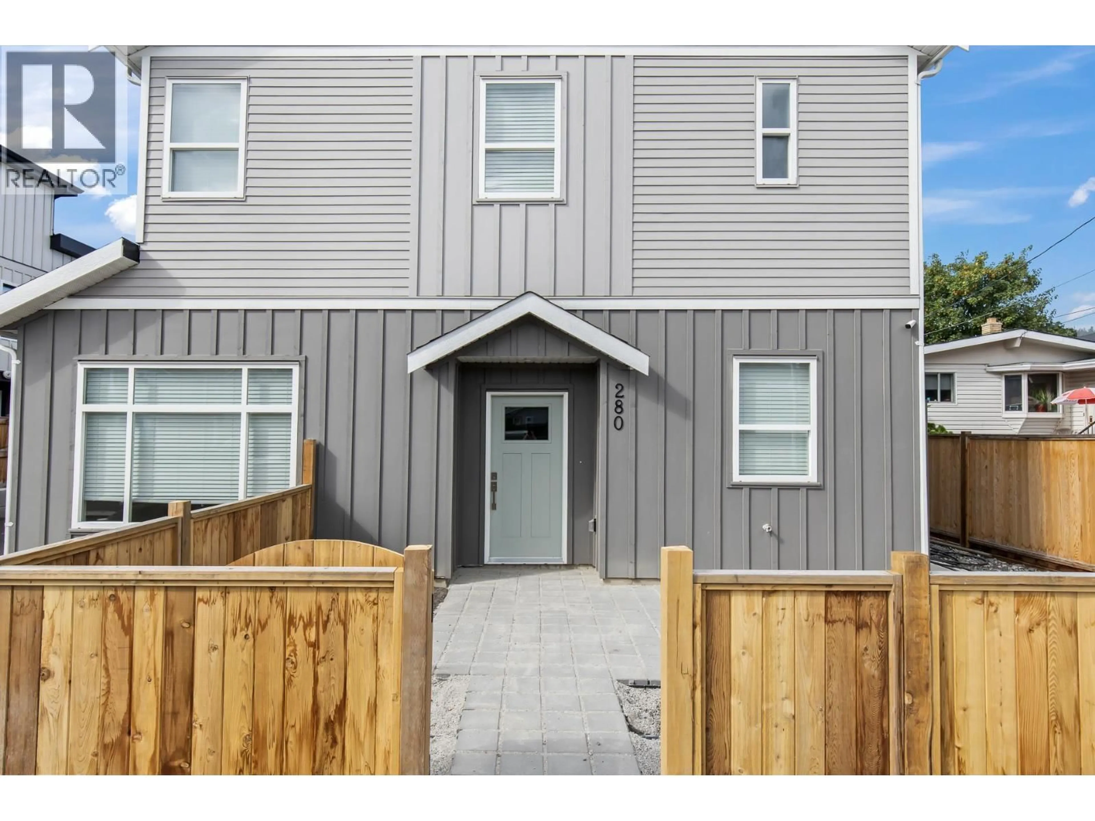 Home with vinyl exterior material, street for 280 NICKEL ROAD, Kelowna British Columbia V1X4E6