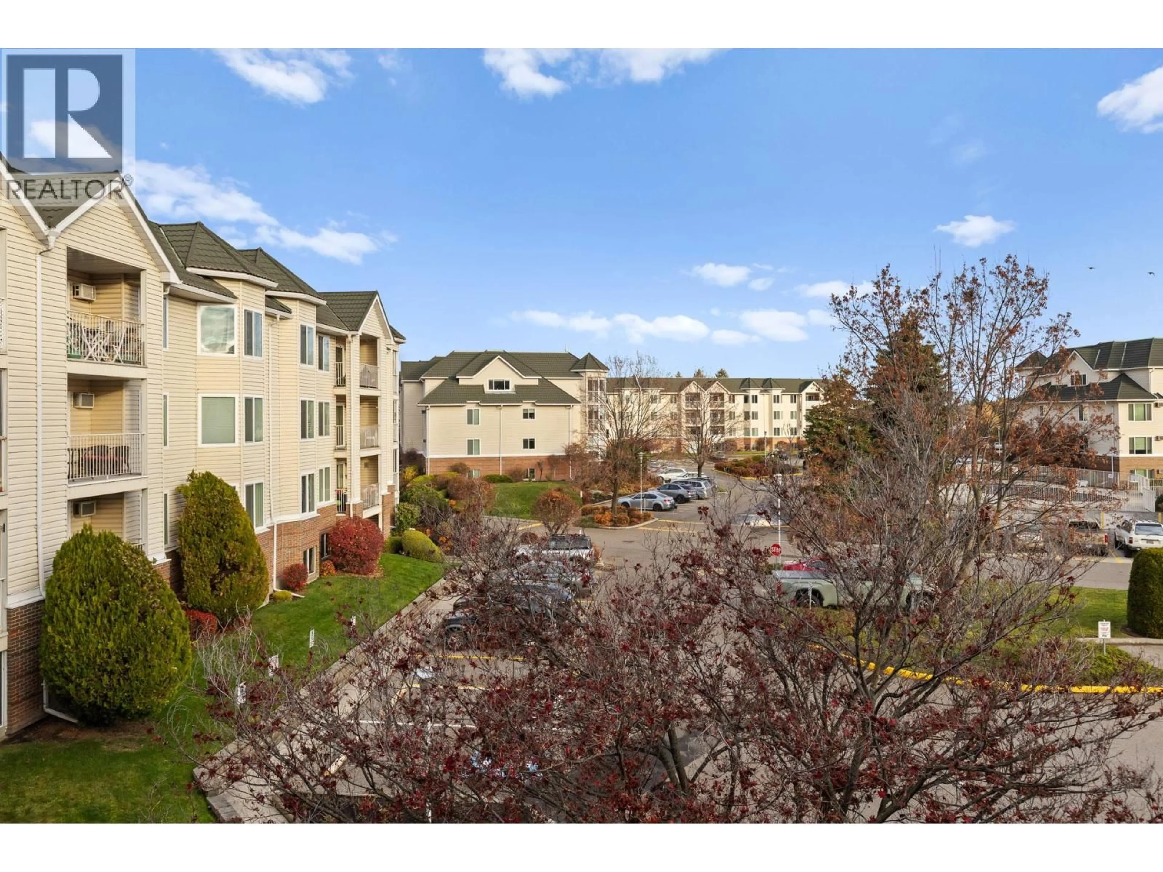 A pic from outside/outdoor area/front of a property/back of a property/a pic from drone, mountain view for 308 - 3163 RICHTER STREET, Kelowna British Columbia V1W3R4