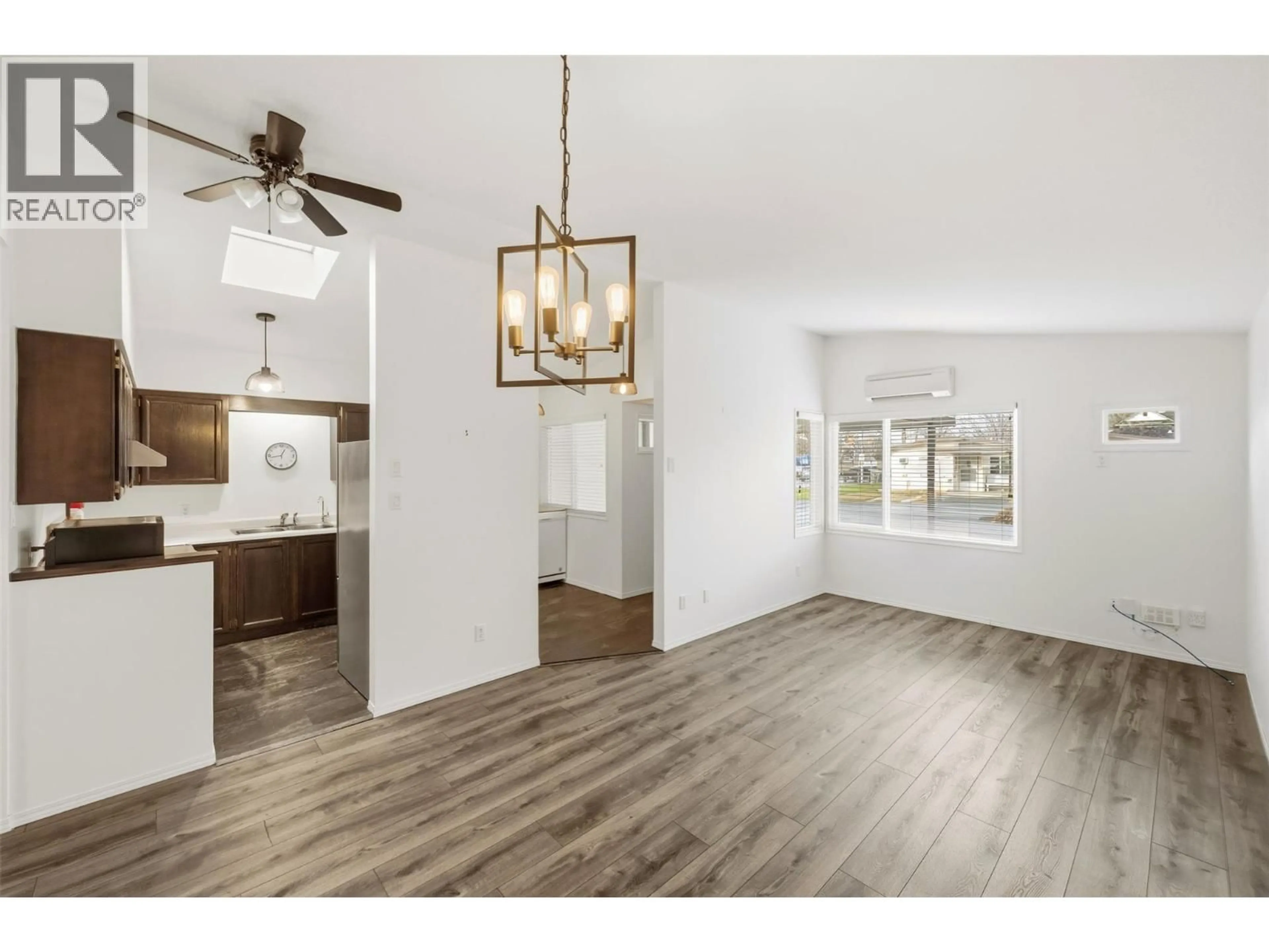 Open concept kitchen, wood/laminate floor for 29 - 854 MAIN STREET, Penticton British Columbia V2A5E4