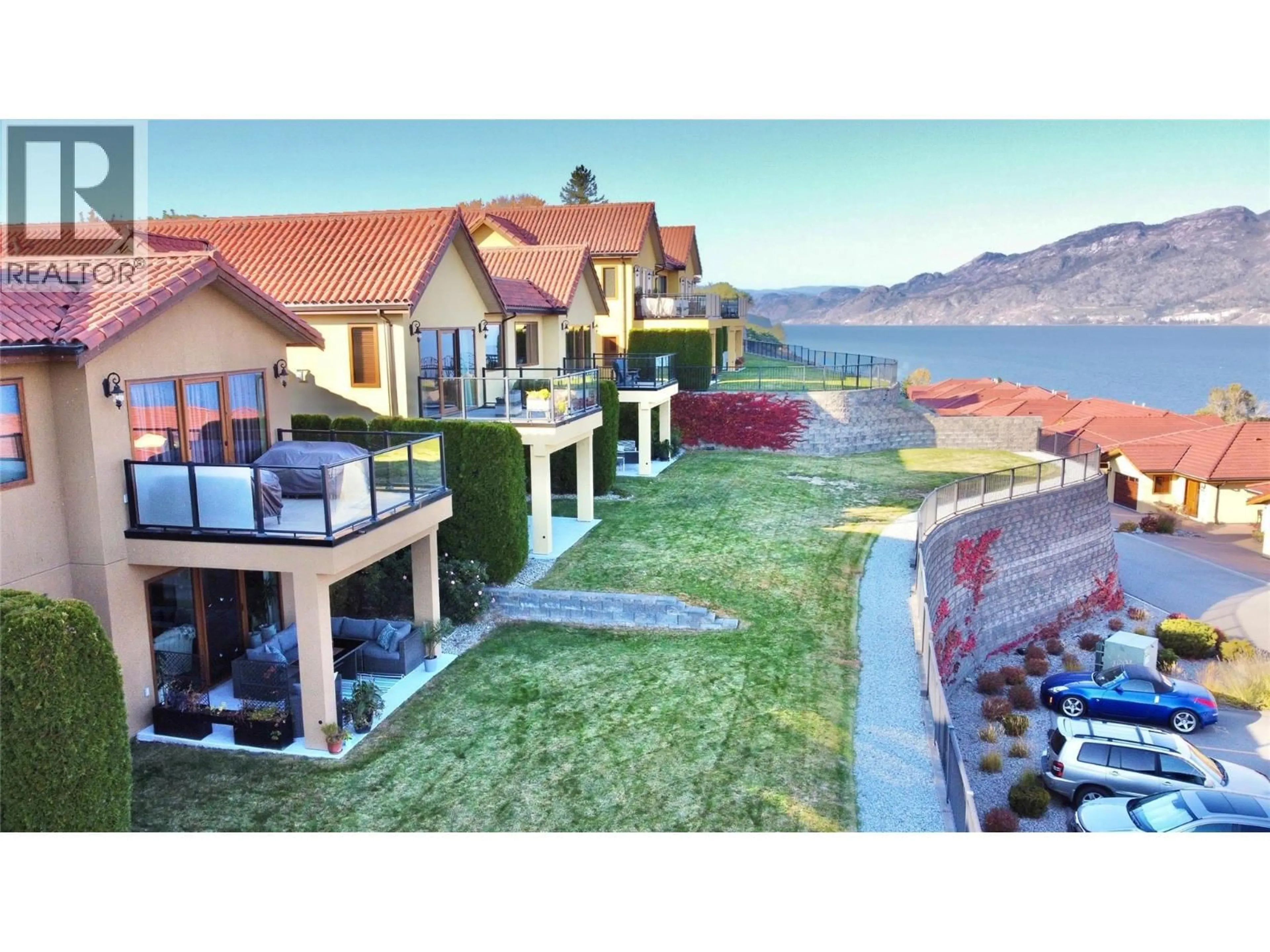 A pic from outside/outdoor area/front of a property/back of a property/a pic from drone, water/lake/river/ocean view for 201 - 14451 DOWNTON AVENUE, Summerland British Columbia V0H1Z1