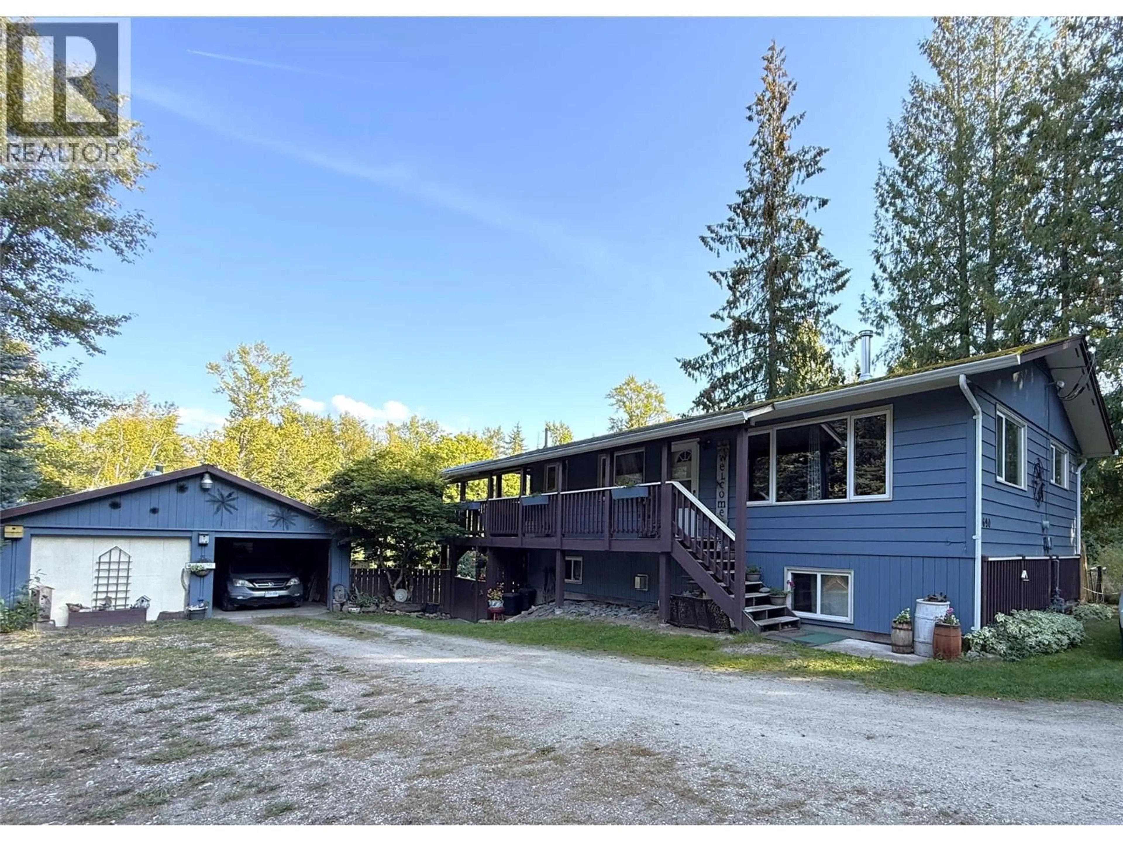 A pic from outside/outdoor area/front of a property/back of a property/a pic from drone, mountain view for 4690 44 AVENUE NORTHWEST, Salmon Arm British Columbia V1E3A7