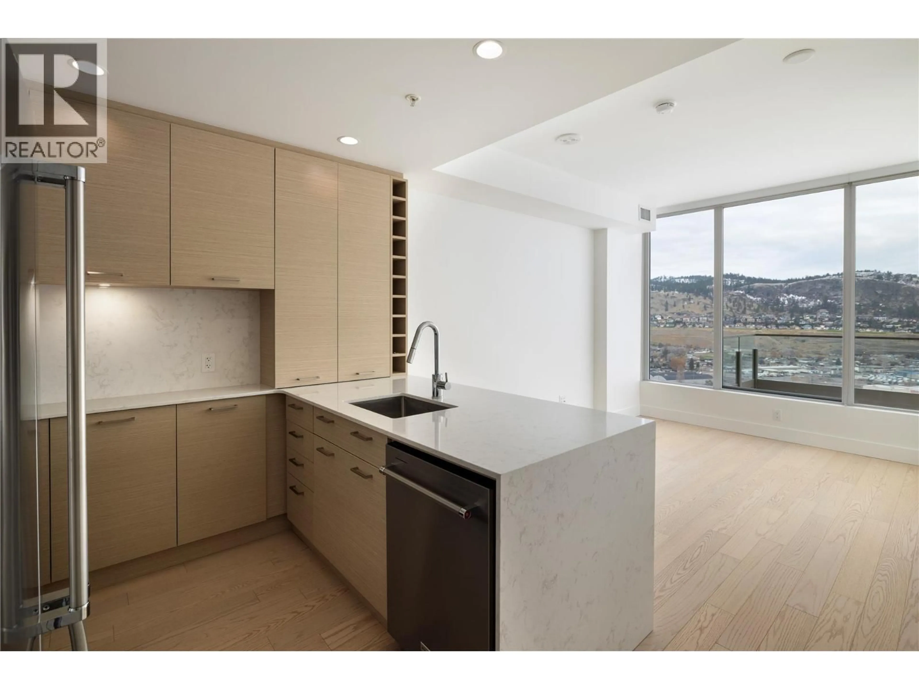 Open concept kitchen, ceramic/tile floor for 2601 - 1191 SUNSET DRIVE, Kelowna British Columbia V1Y0J4