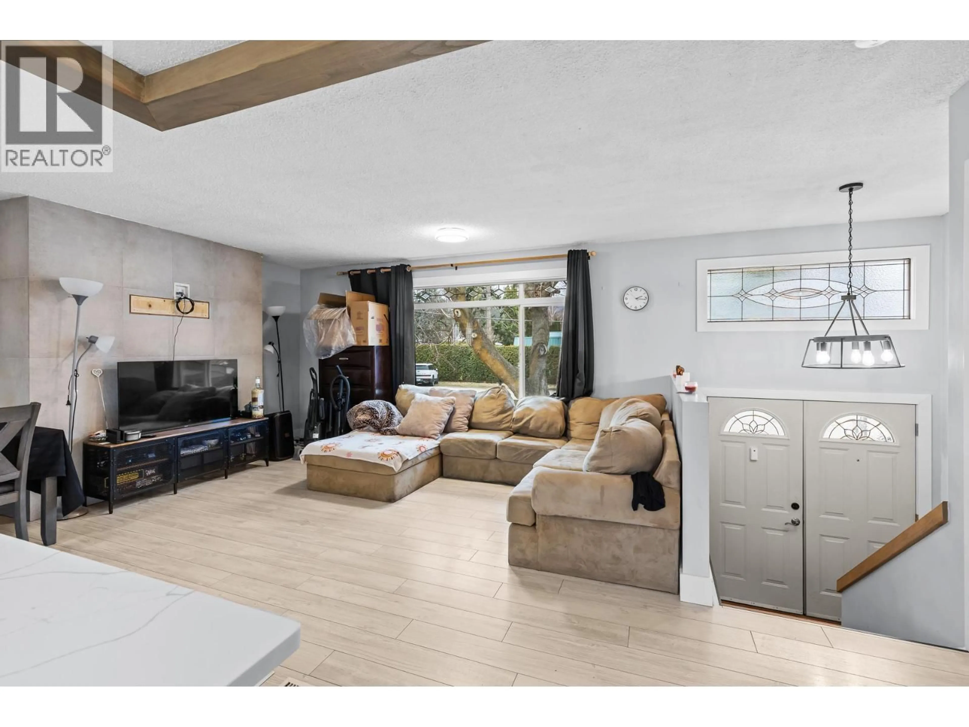 Living room with furniture, unknown for 714 YOUNG ROAD, Kelowna British Columbia V1W1A8