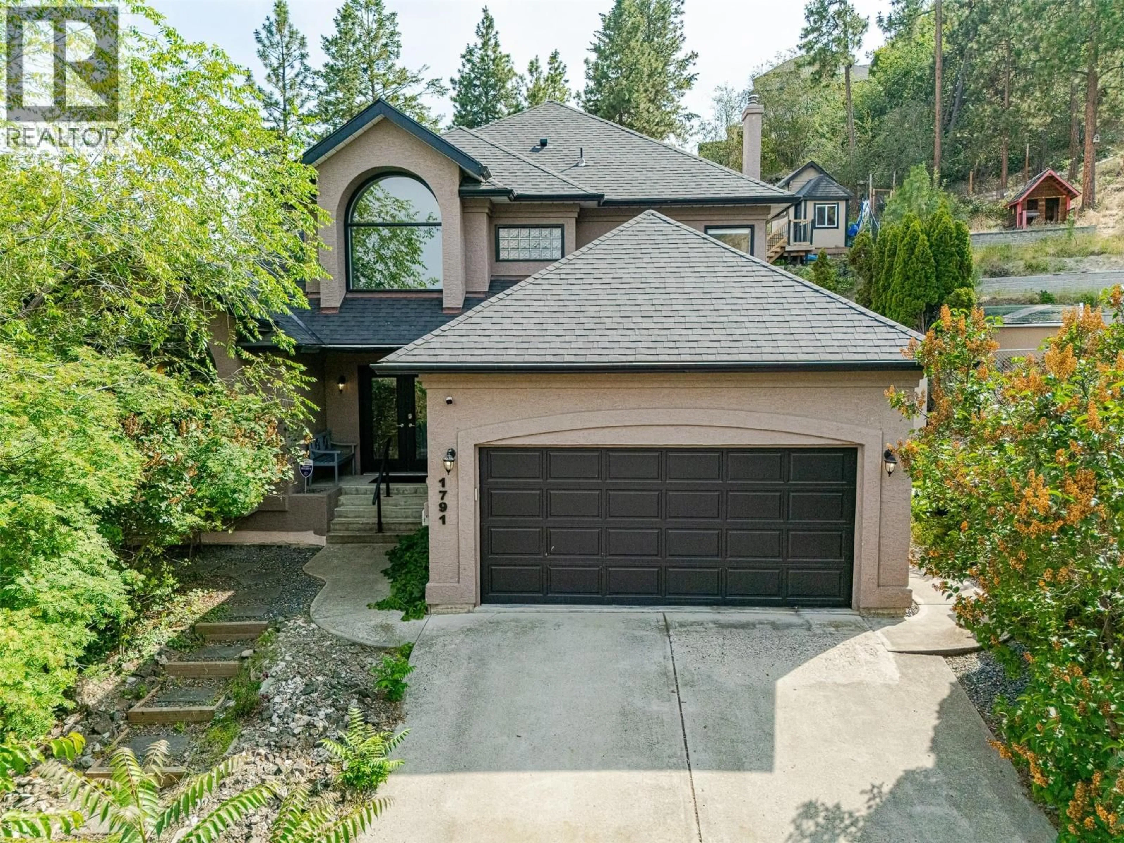 A pic from outside/outdoor area/front of a property/back of a property/a pic from drone, street for 1791 SPRUCEGROVE COURT, Kelowna British Columbia V1V1P3