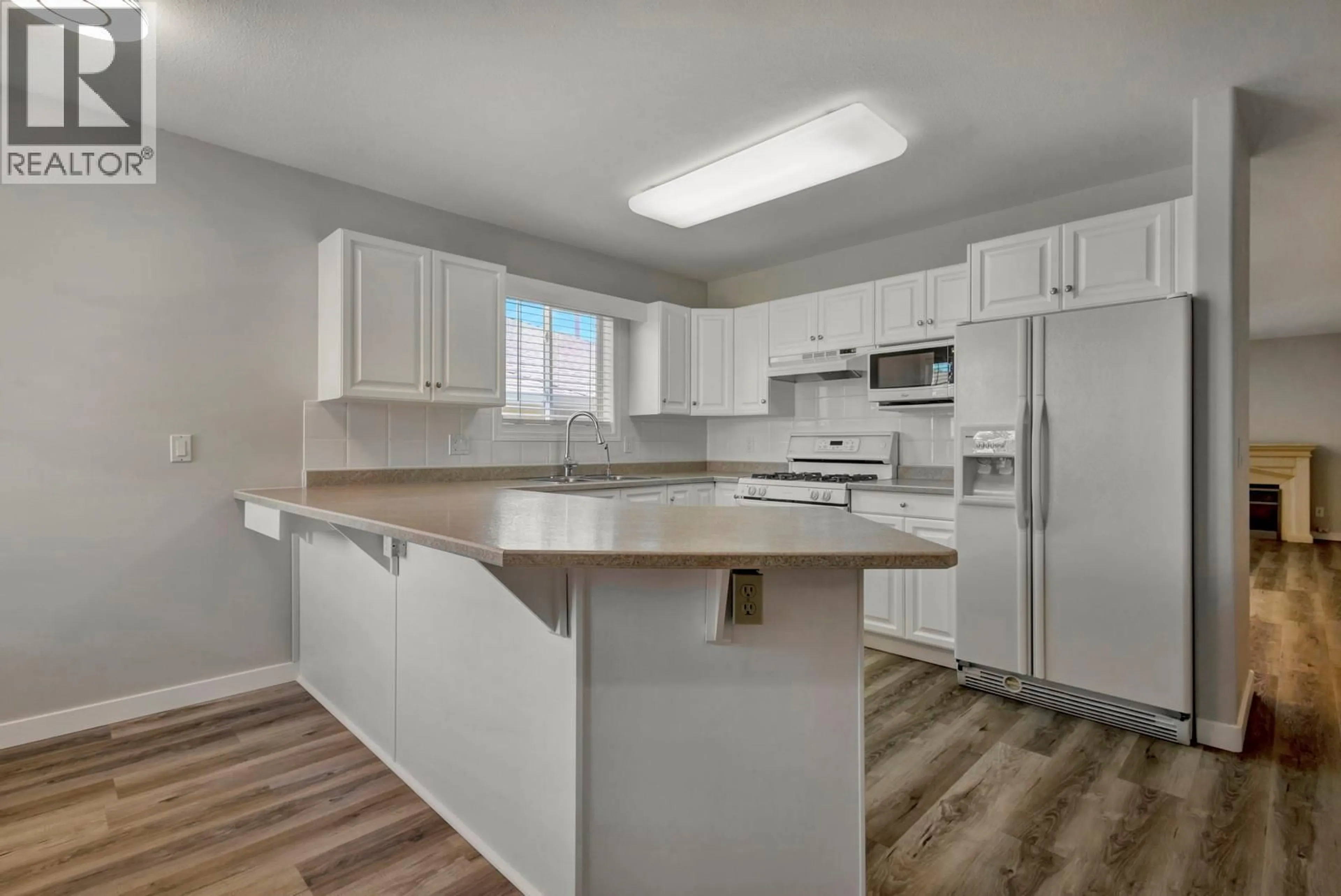 Open concept kitchen, unknown for 121 - 2250 LOUIE DRIVE, Westbank British Columbia V4T2M6