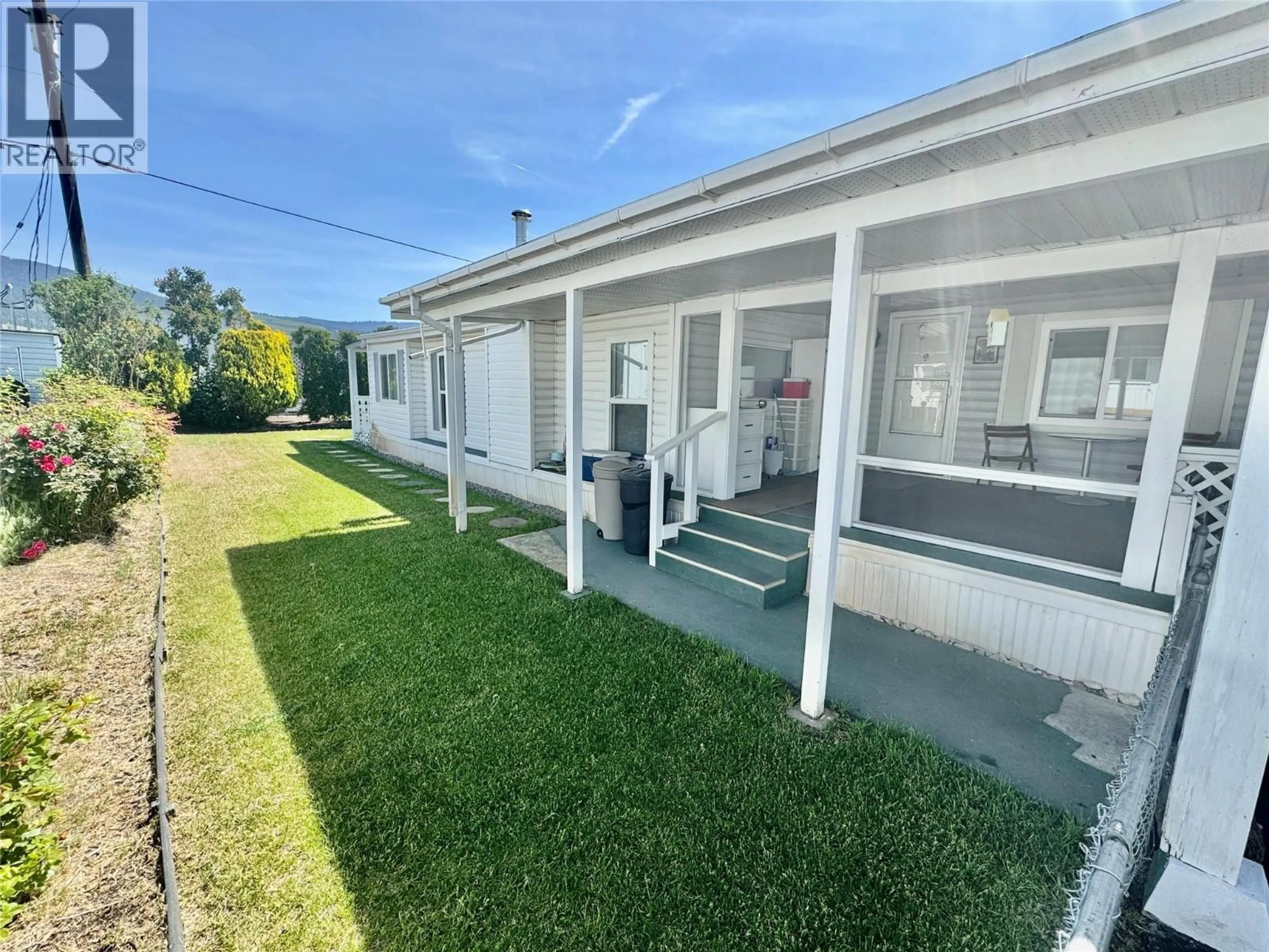 A pic from outside/outdoor area/front of a property/back of a property/a pic from drone, street for 135 - 720 COMMONWEALTH ROAD, Kelowna British Columbia V4V1R8