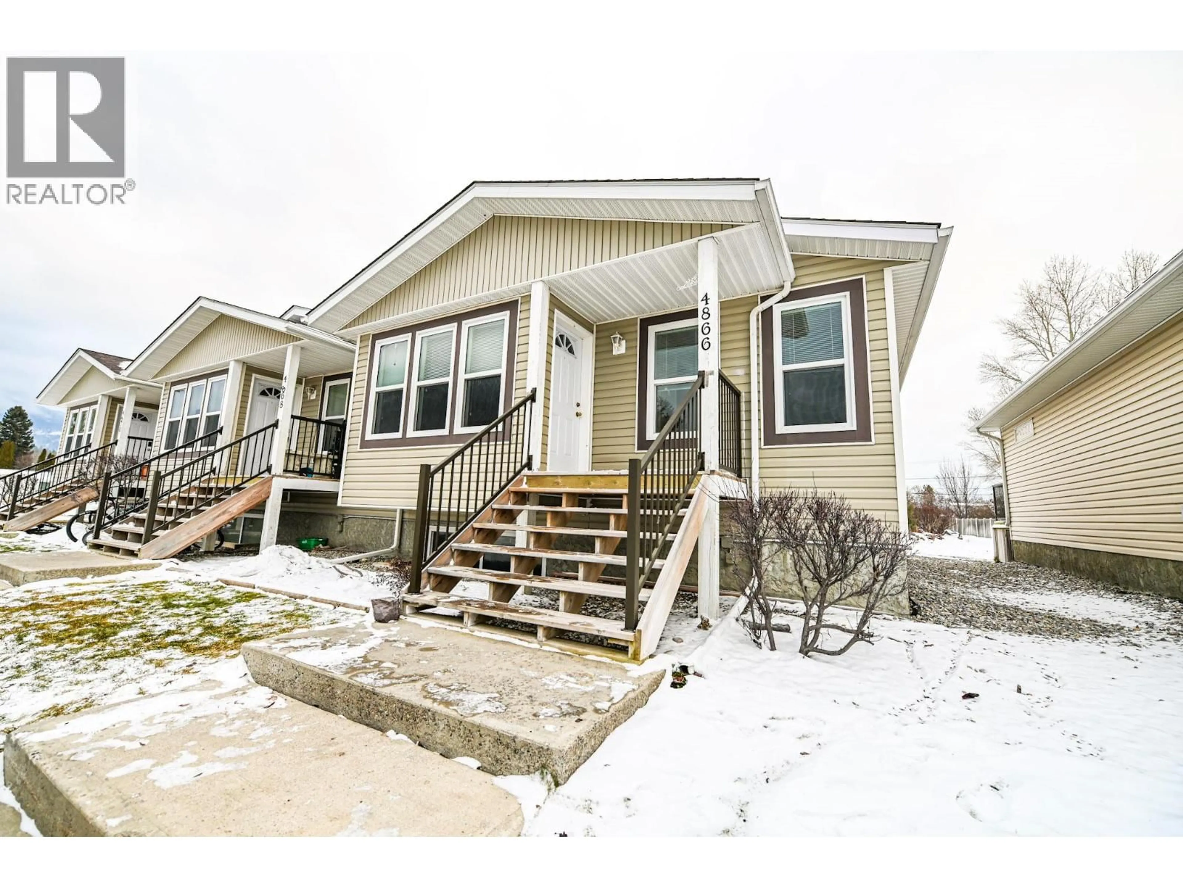 Home with vinyl exterior material, street for 4866 EMERALD AVENUE, Canal Flats British Columbia V0B1B0