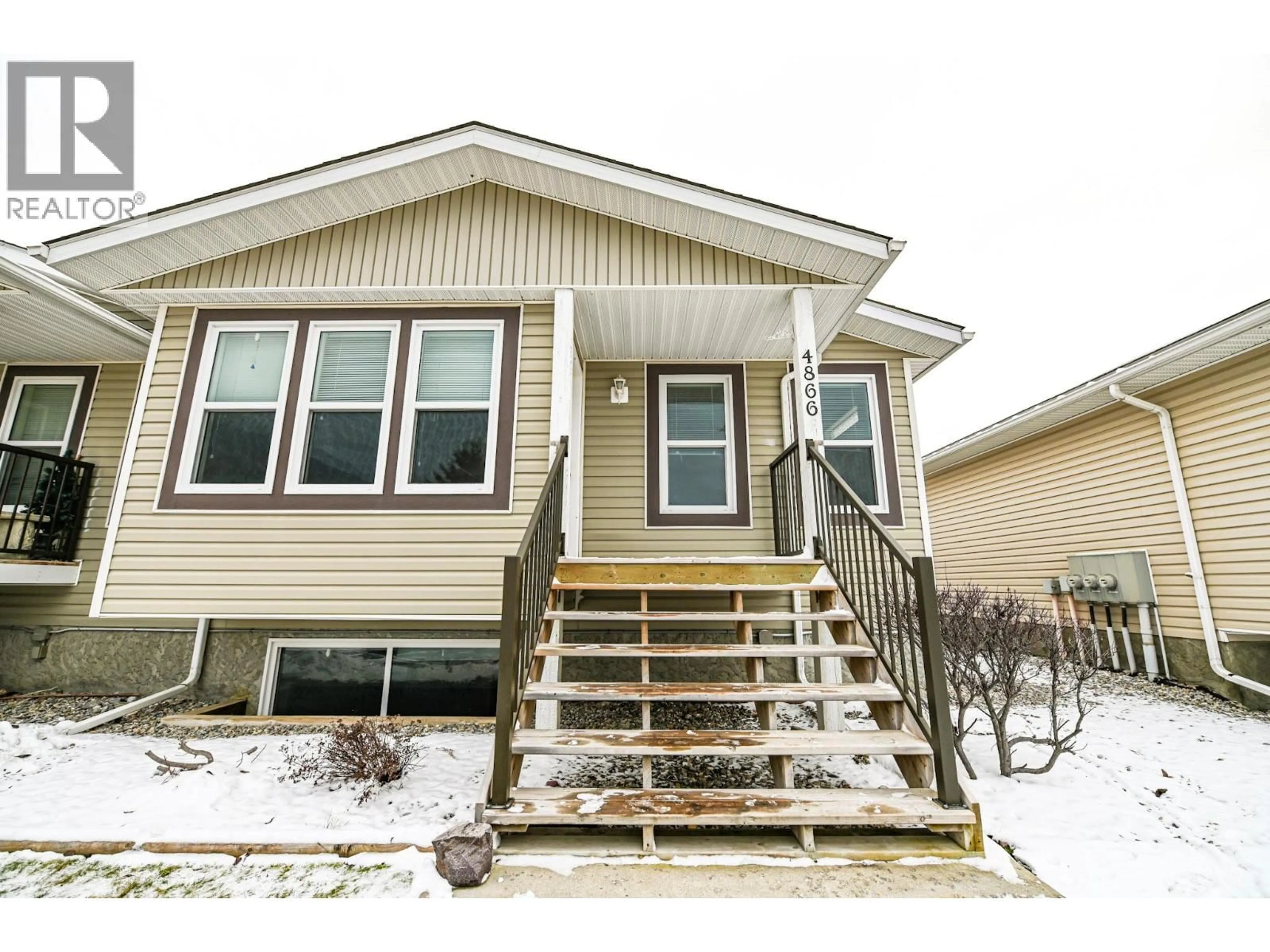 Home with vinyl exterior material, street for 4866 EMERALD AVENUE, Canal Flats British Columbia V0B1B0