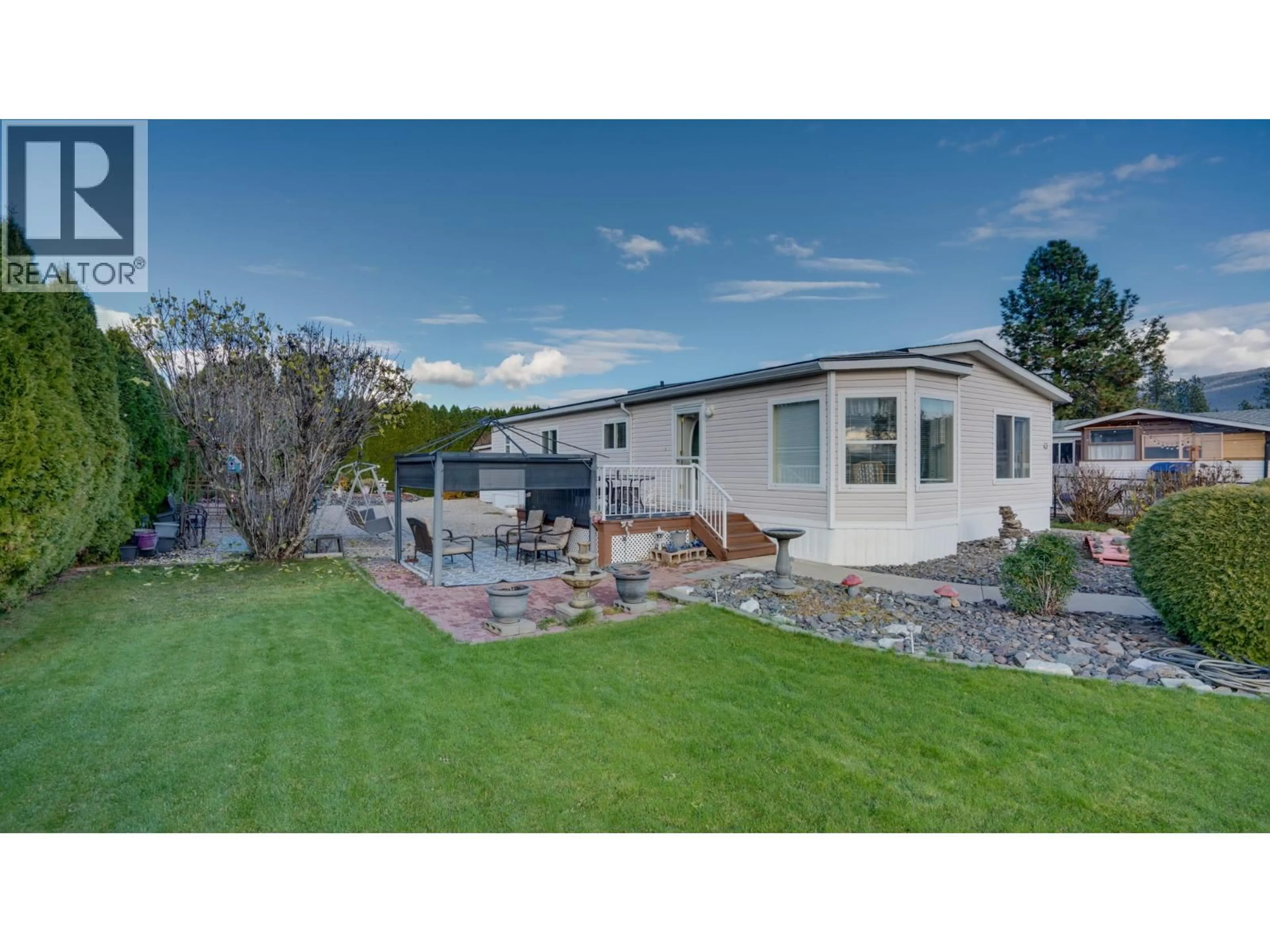 A pic from outside/outdoor area/front of a property/back of a property/a pic from drone, unknown for 43 - 9510 HIGHWAY 97N OTHER, Vernon British Columbia V1H1R8