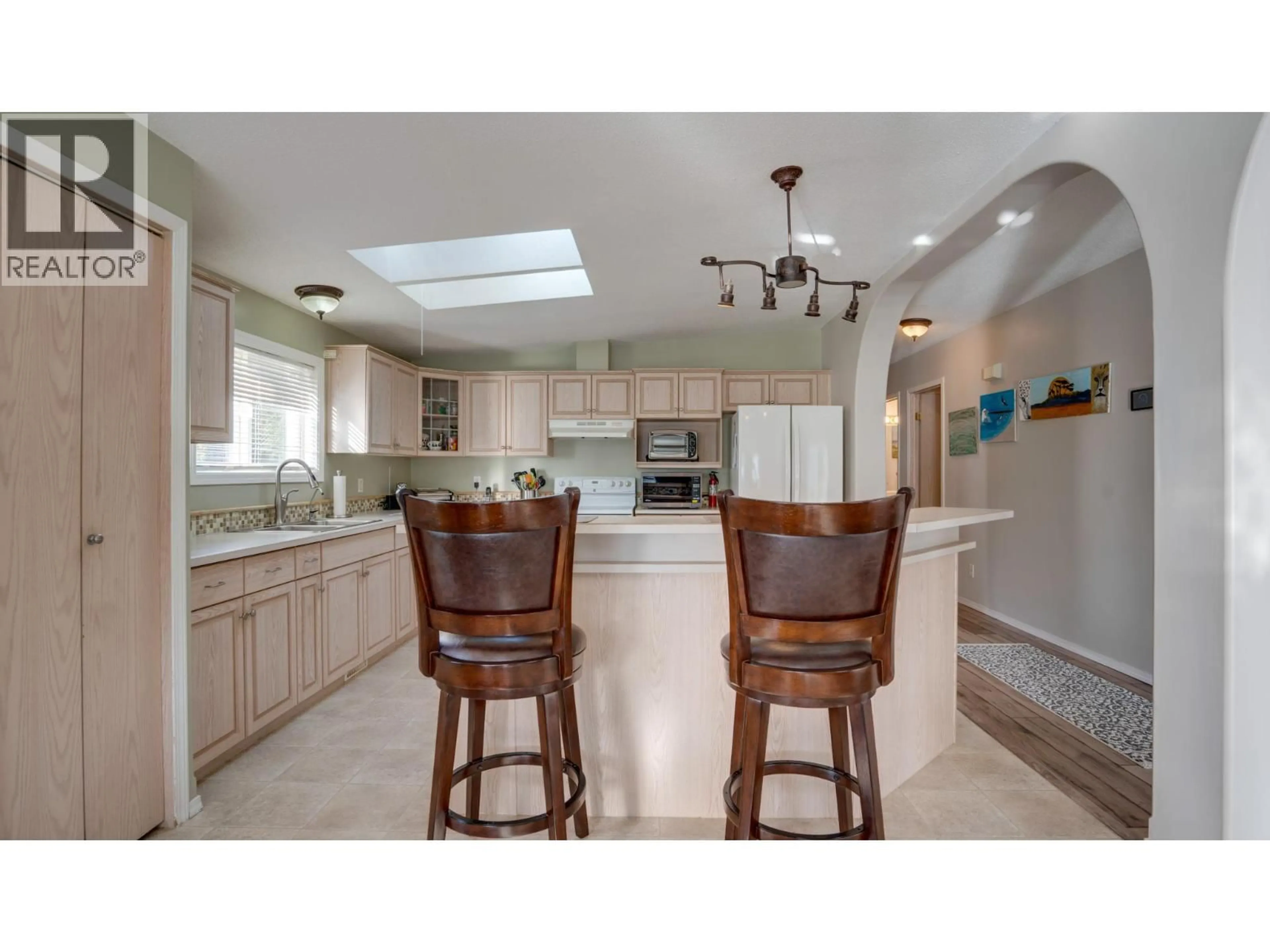 Open concept kitchen, ceramic/tile floor for 43 - 9510 HIGHWAY 97N OTHER, Vernon British Columbia V1H1R8