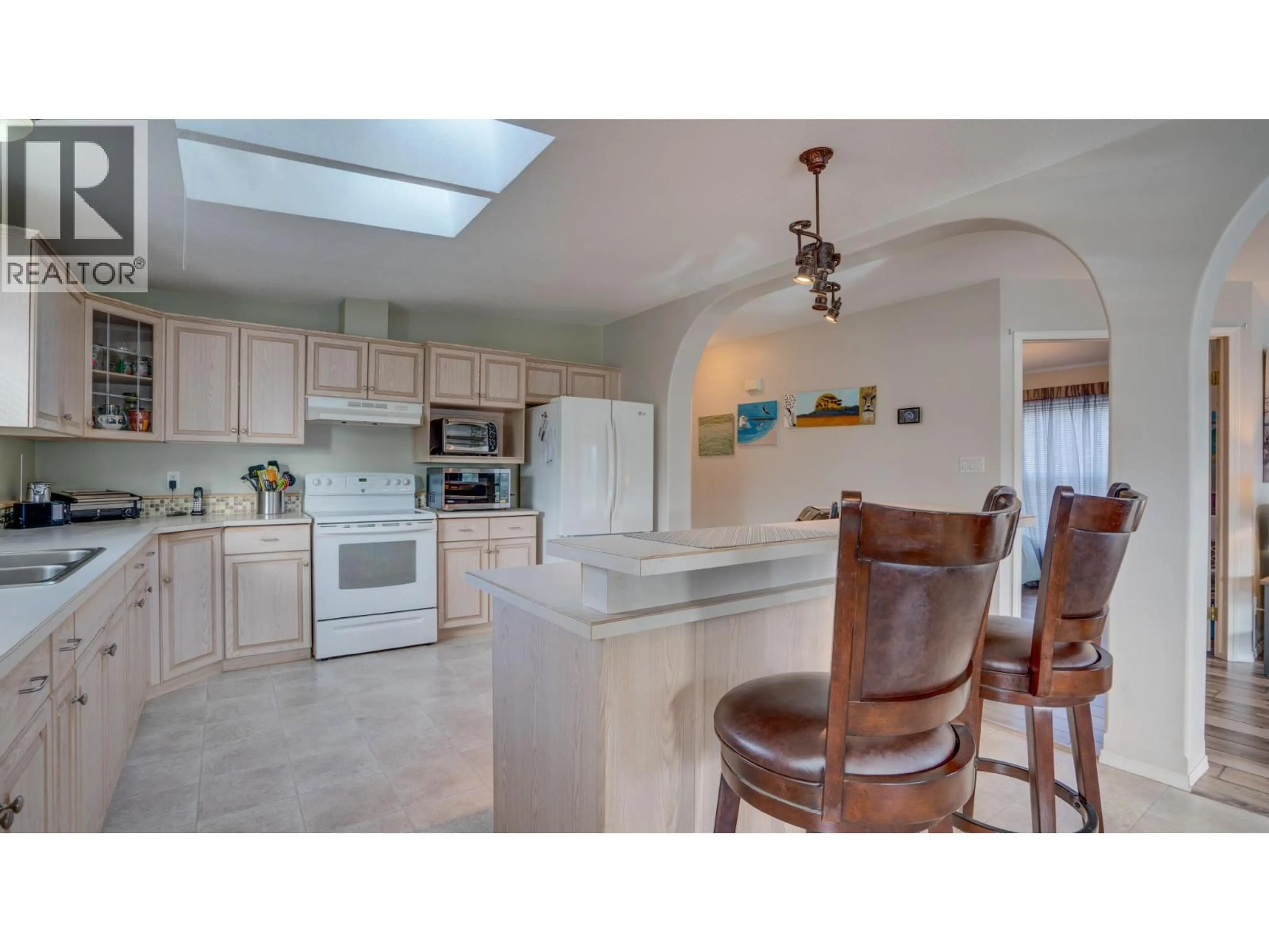 Open concept kitchen, ceramic/tile floor for 43 - 9510 HIGHWAY 97N OTHER, Vernon British Columbia V1H1R8