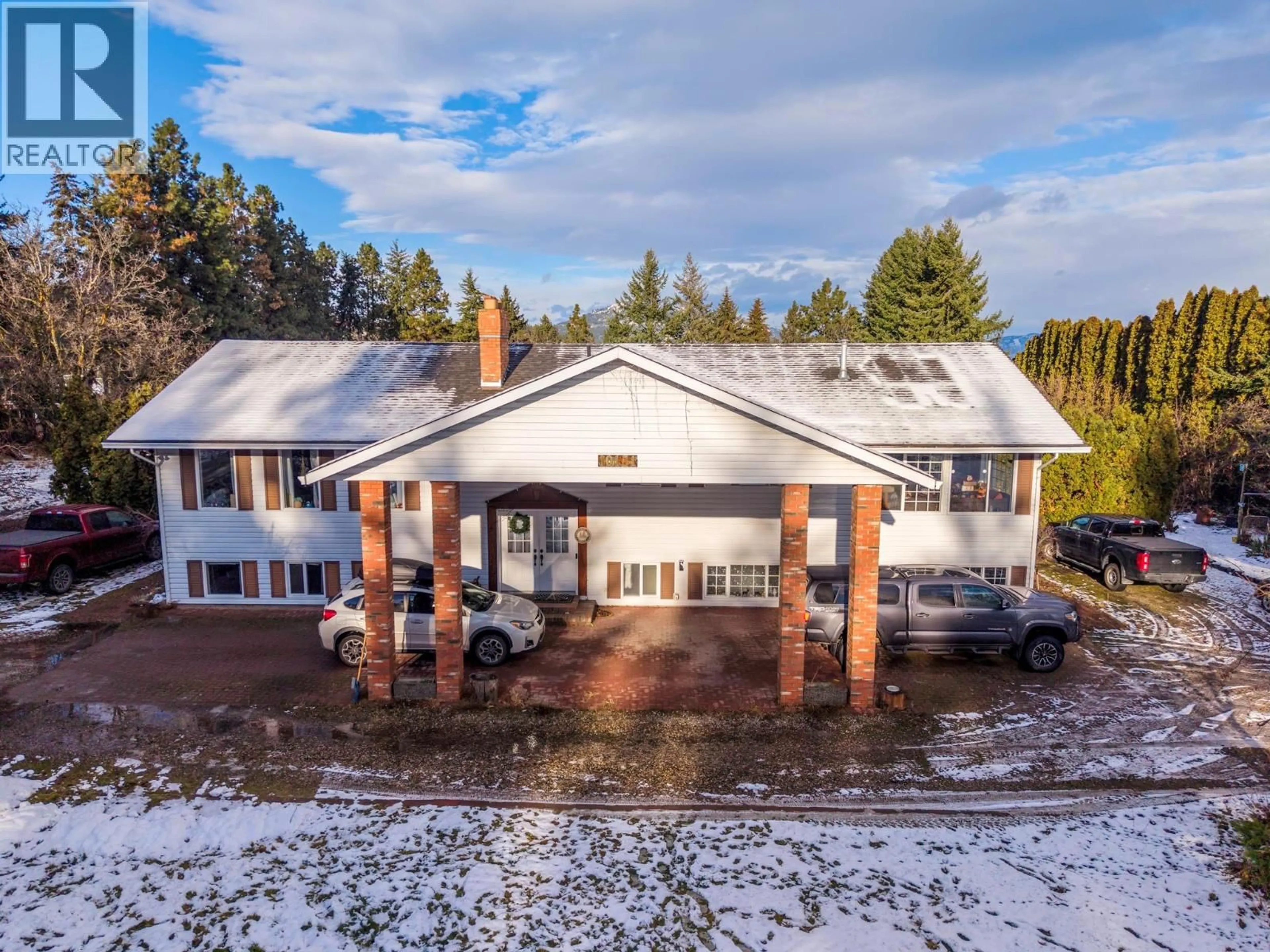A pic from outside/outdoor area/front of a property/back of a property/a pic from drone, building for 10151 CHASE ROAD, Lake Country British Columbia V4V1P3