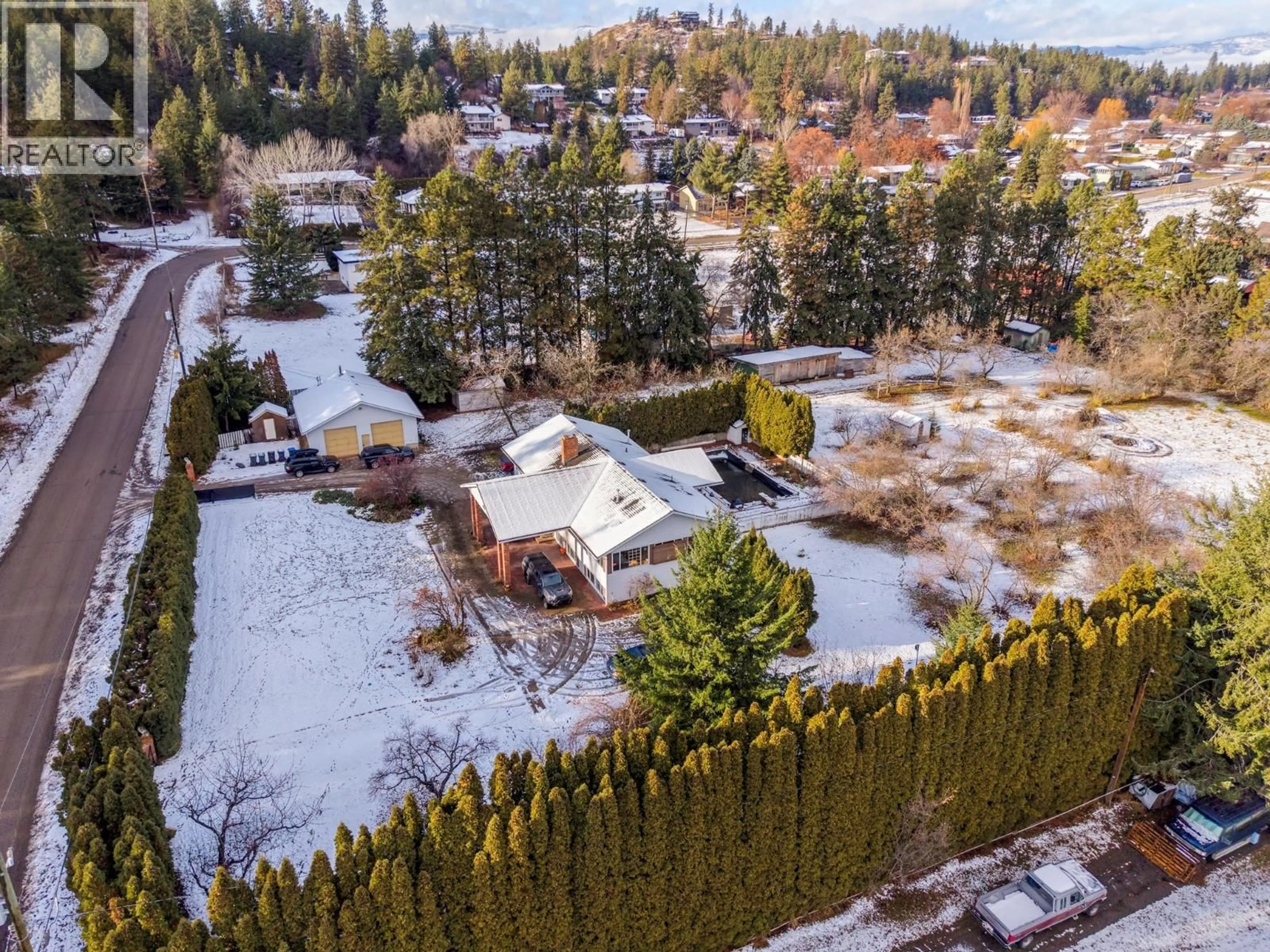 A pic from outside/outdoor area/front of a property/back of a property/a pic from drone, forest/trees view for 10151 CHASE ROAD, Lake Country British Columbia V4V1P3